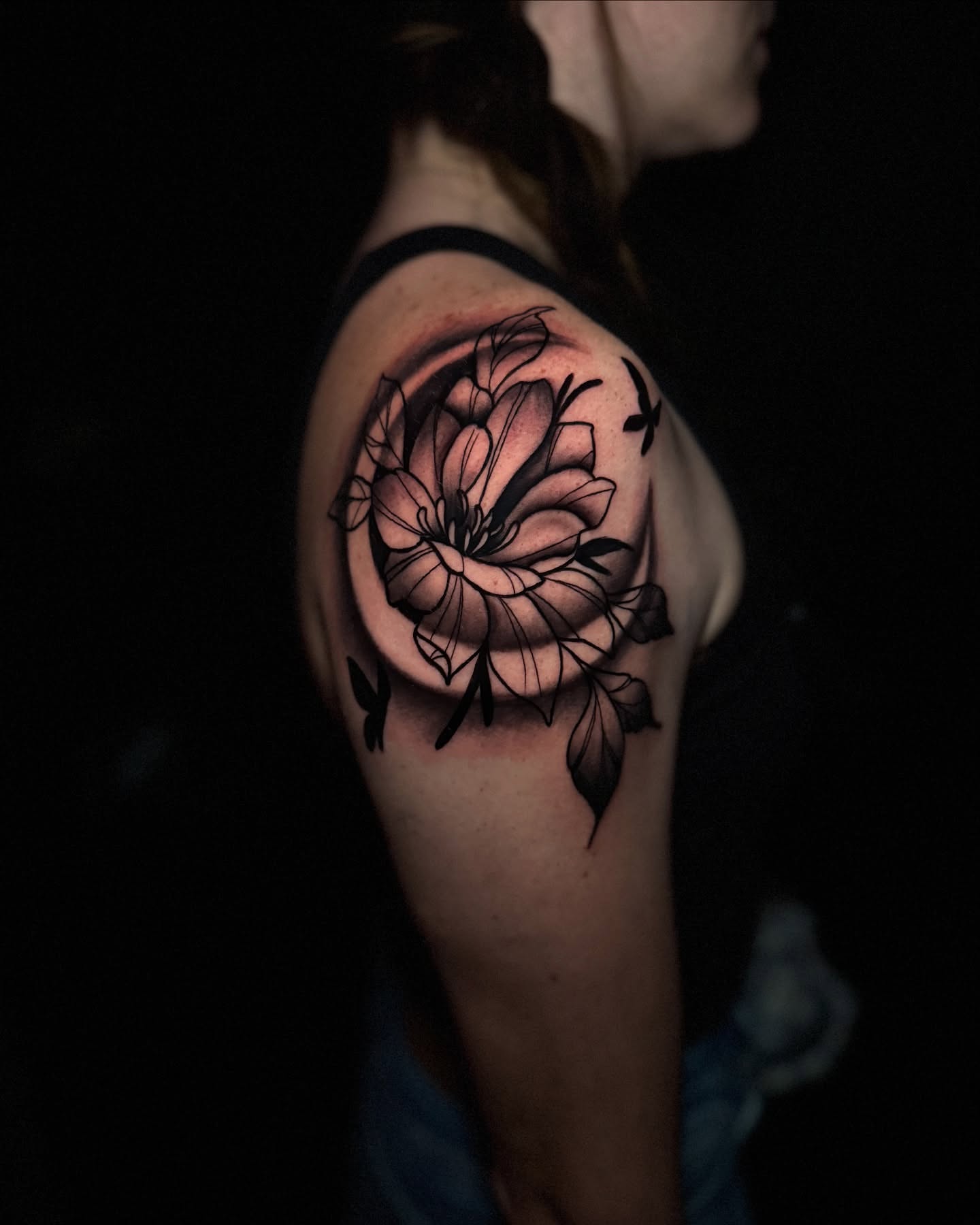 Flower black and grey tattoo on the shoulder by Ryland - Tattoo Artist