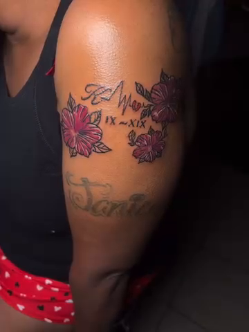 Lettering tattoo on the upper arm by Mc X Happo