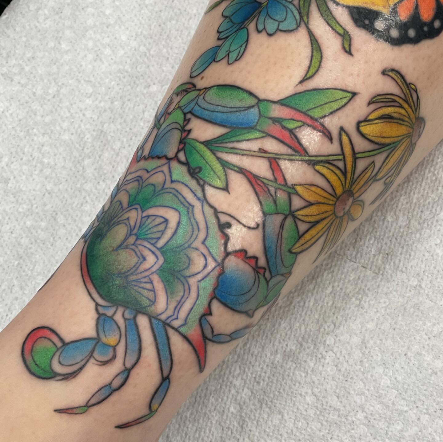 Floral crab American traditional tattoo on the forearm by ๐ณ๐๐๐๐ข ๐ต๐๐๐๐๐๐
