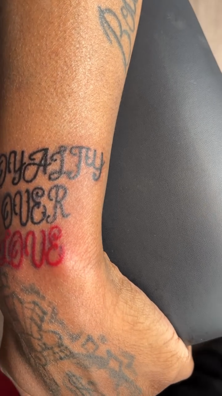 Loyalty Over Love tattoo lettering tattoo on the foot by 702tattoo💉🩸