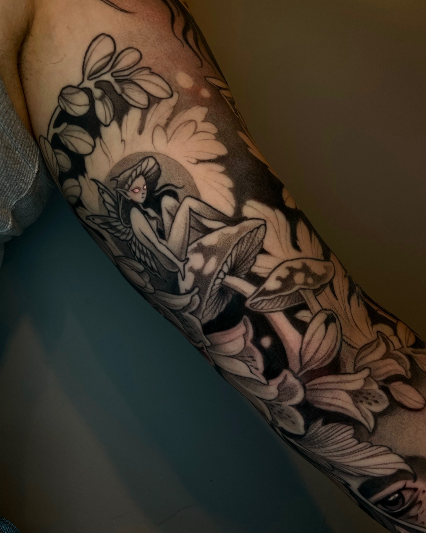Fairy and flowers realism tattoo on the forearm by Madelyn Roberts, Bellingham, Washington