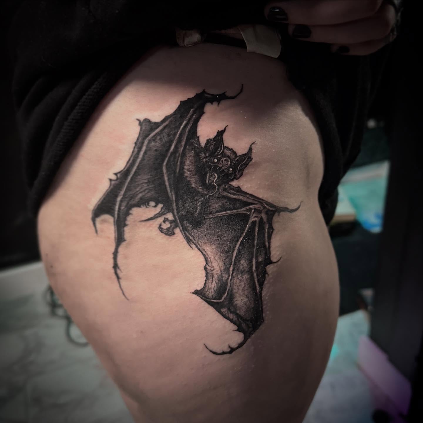 Bat realism tattoo on the thigh by AaronAdlerTattoos.com, Cincinnati