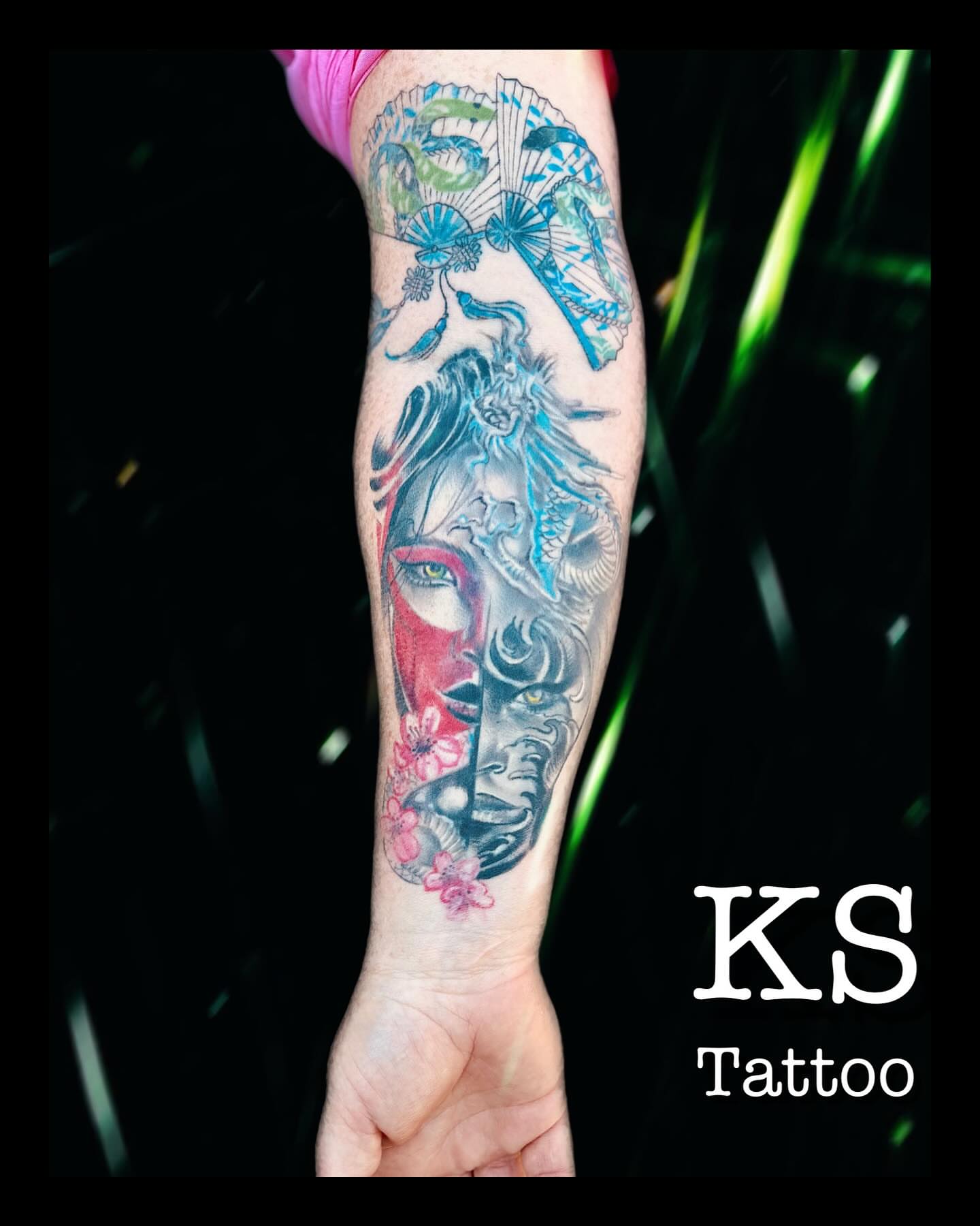 Mask and dragonfly japanese irezumi tattoo on the forearm by Karen Smith