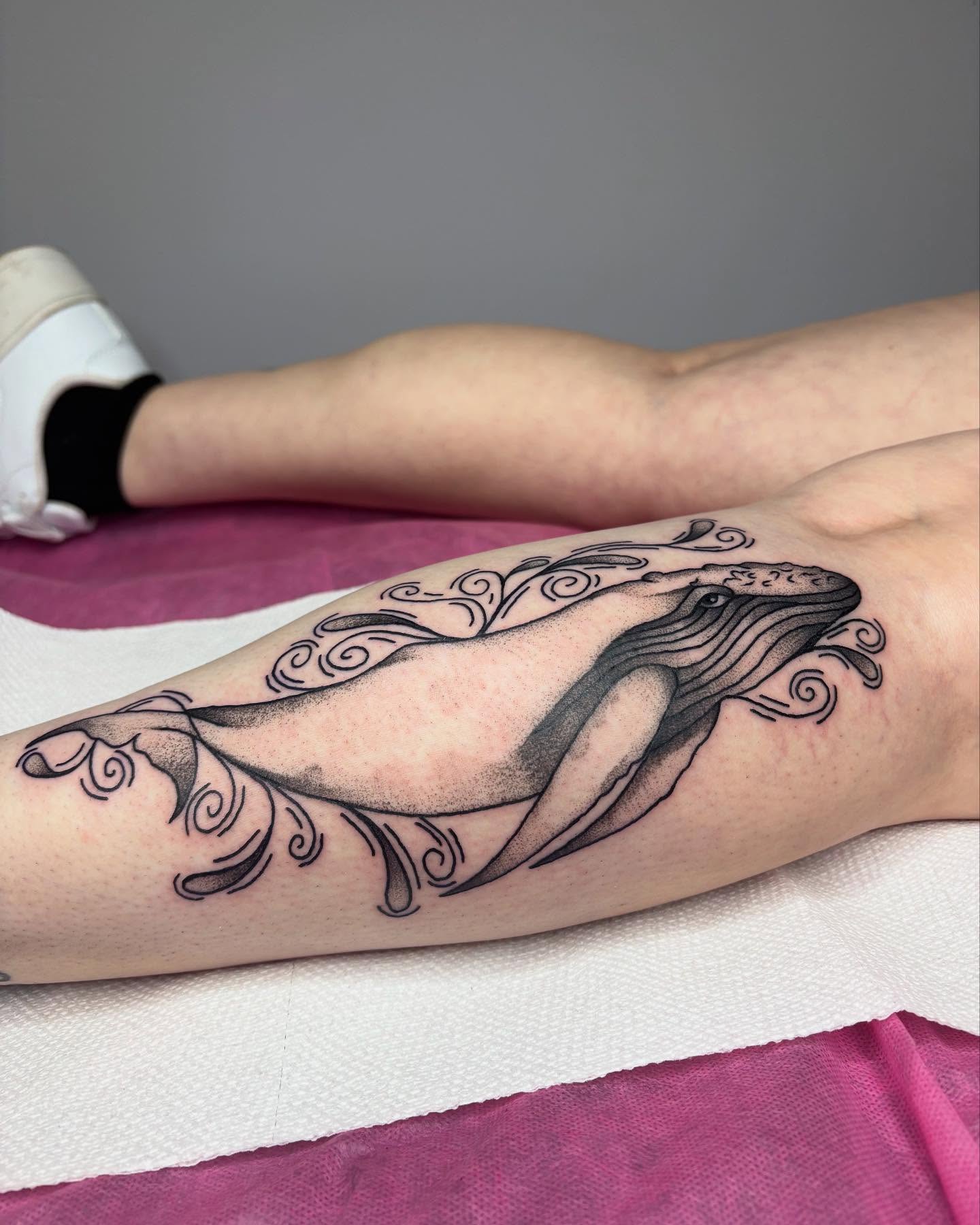 Whale black and grey tattoo on the forearm by kylie
