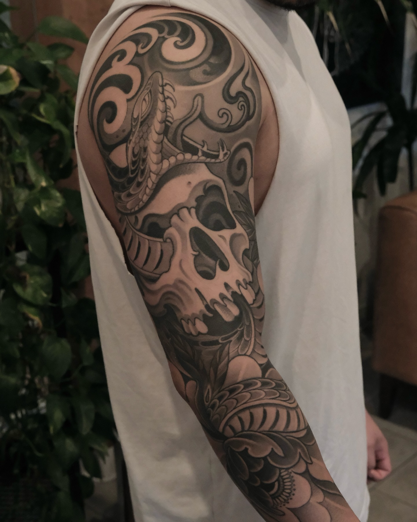 Skull and dragon realism tattoo on the upper arm by ๐ฃ๐๐๐ ๐๐ ๐ฆ๐๐๐ฉ๐
