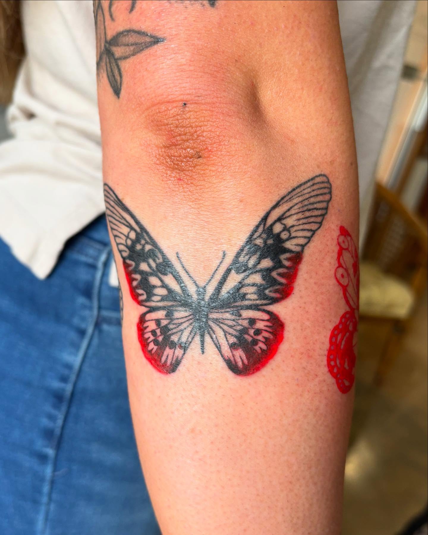 Butterfly black and grey tattoo on the forearm by Anna Kathleen, Des Moines, Iowa