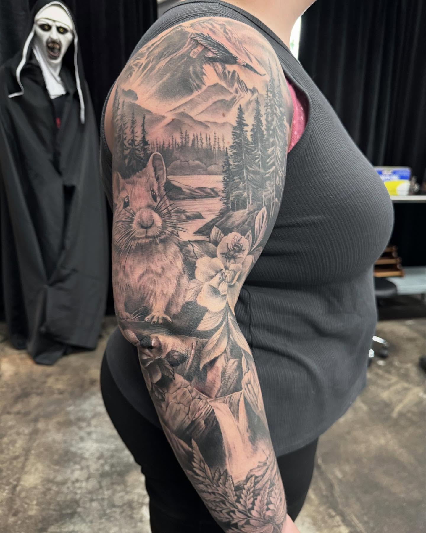 Tattoo by @travisbrowntattoos — realism, black_and_grey