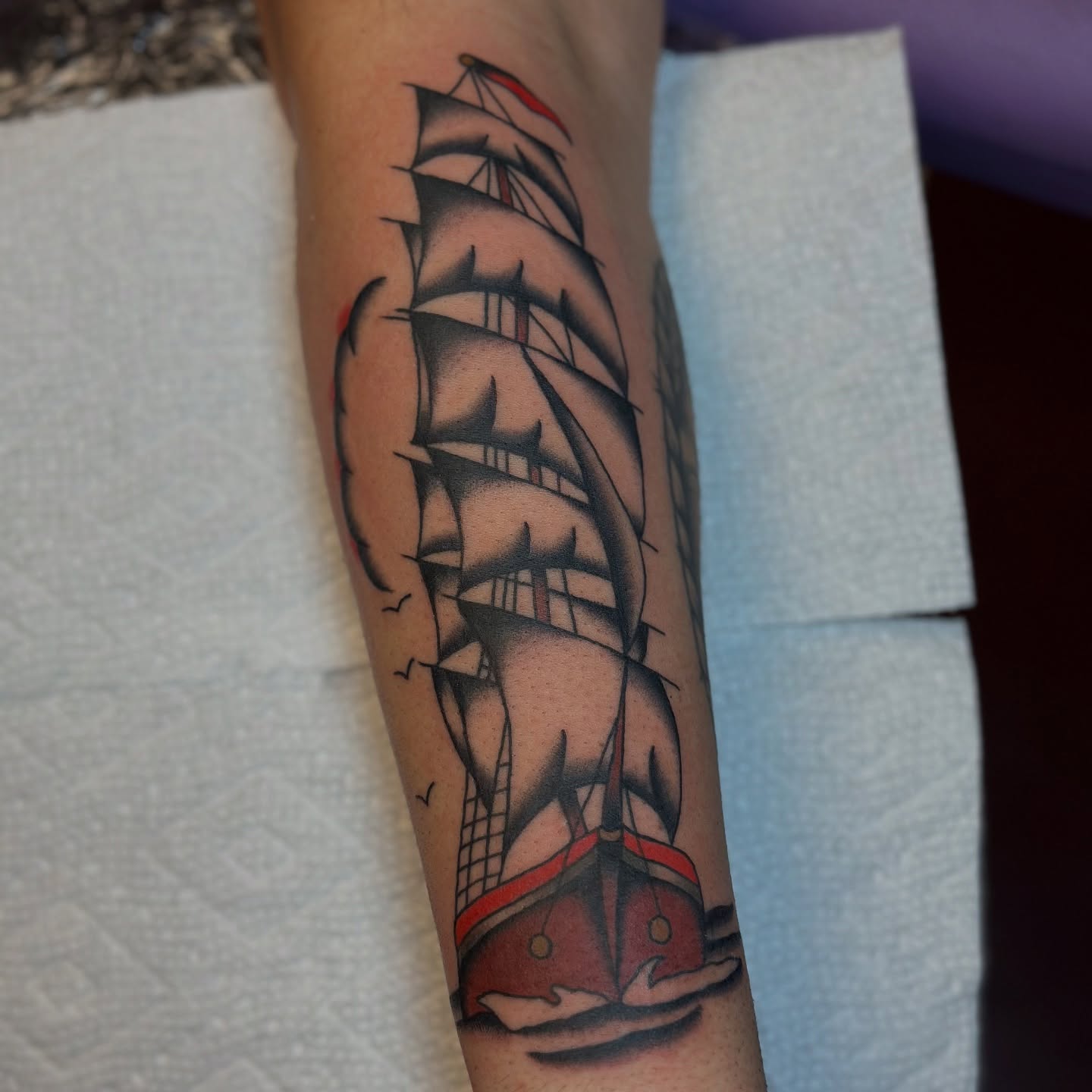 Sailboat American traditional tattoo on the forearm by @ryleecoyote, New York, New York