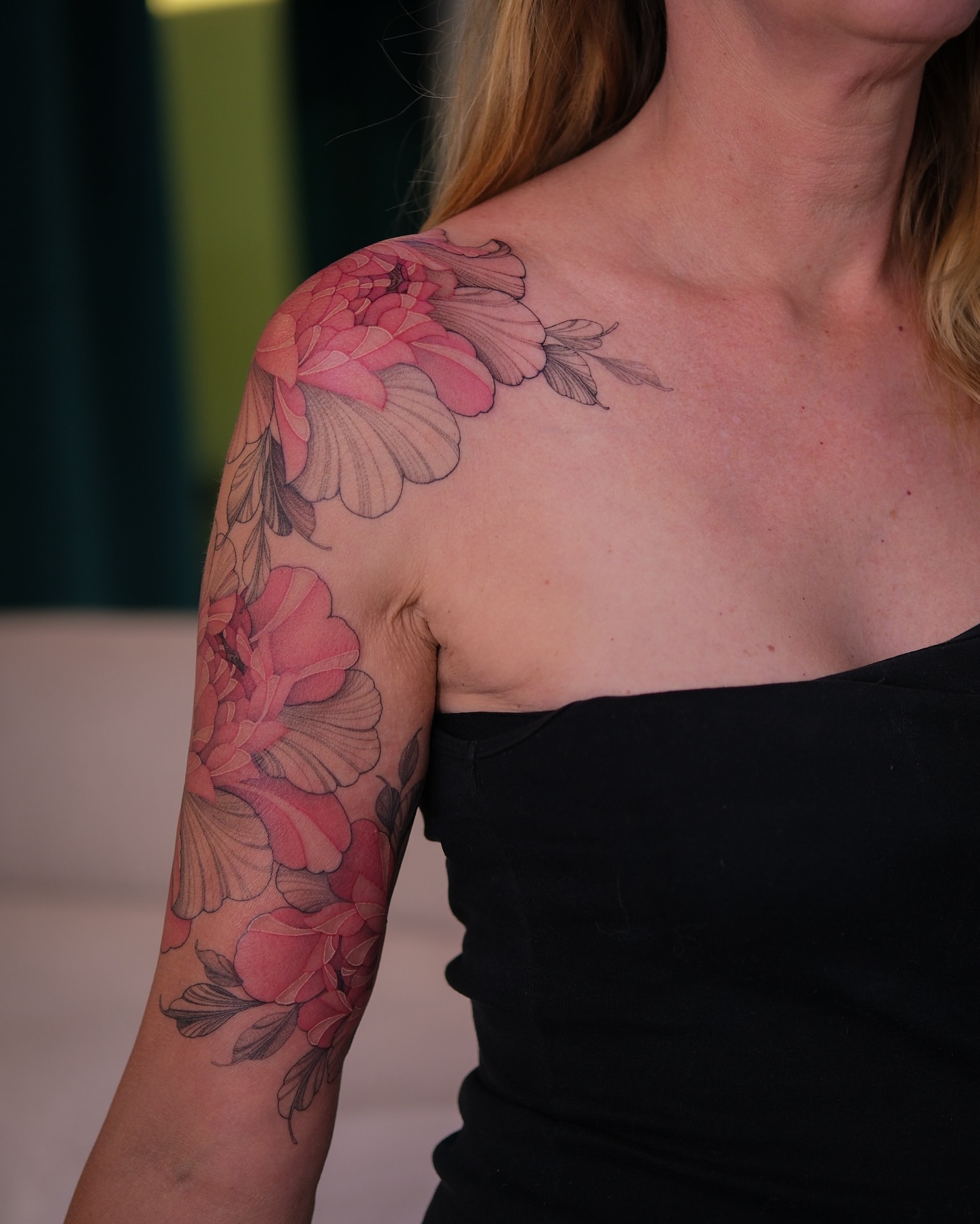 Floral realism tattoo on the shoulder by Flower Tattoo Sf