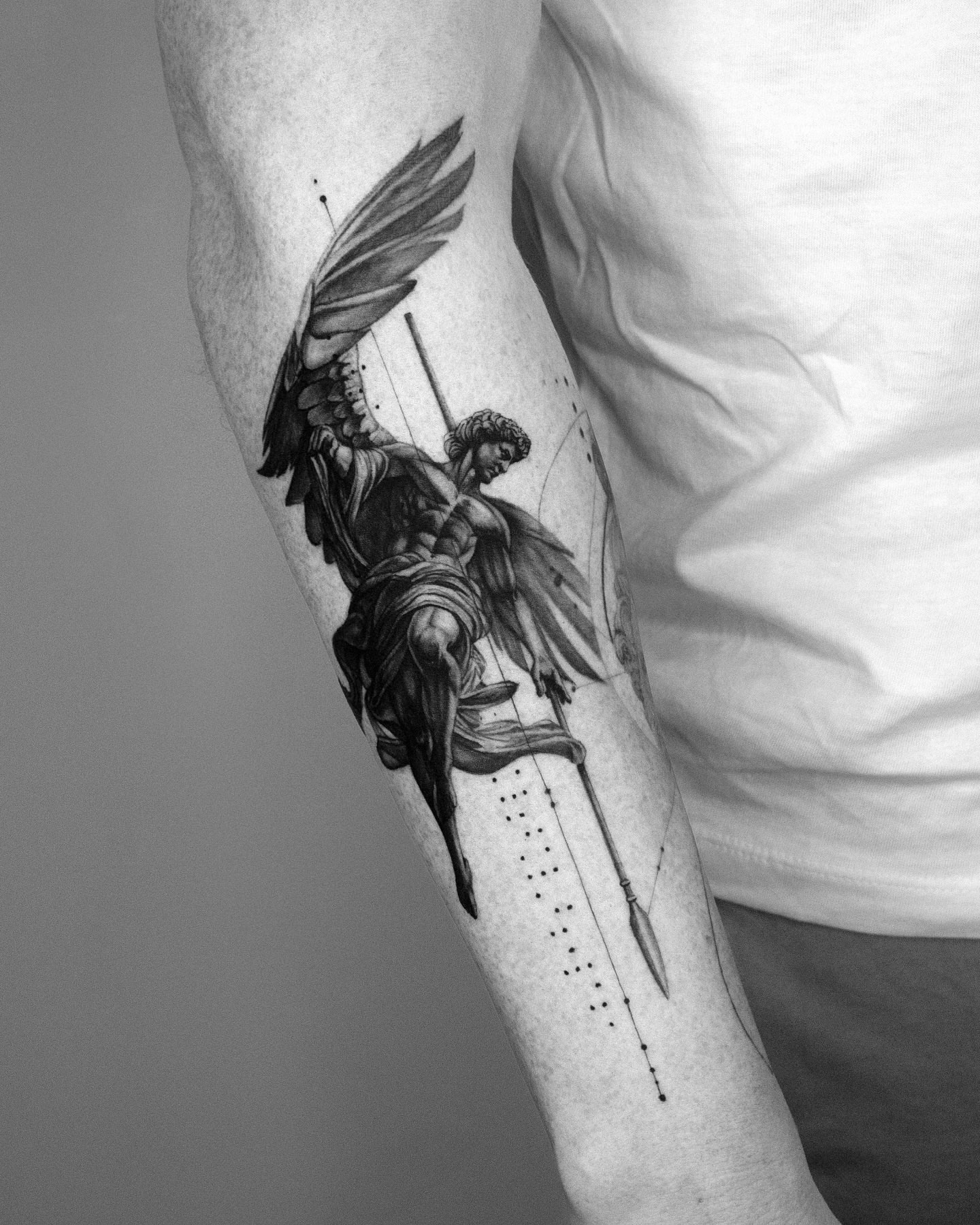 Angel with sword realism tattoo on the forearm by János Bozóki, Budapest, Hungary