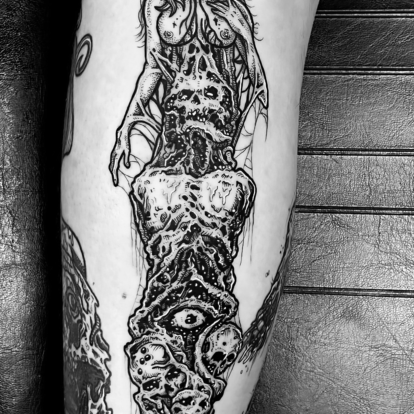 Tattoo by @jonvonschlong — black_and_grey, dark_realism