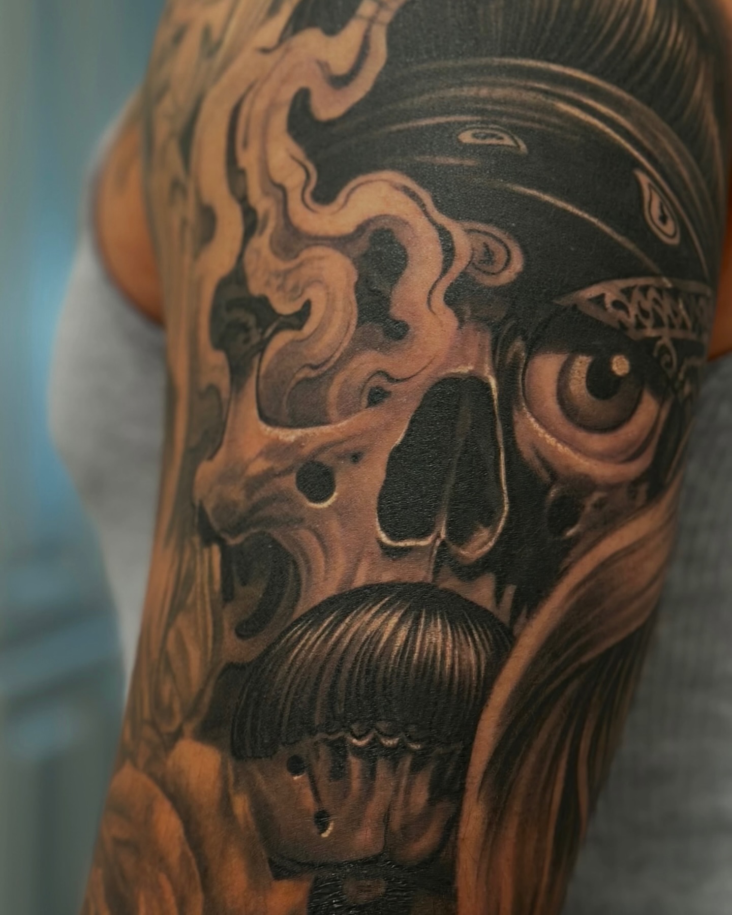 Skull realism tattoo on the forearm by Dillinger, Ventura, California