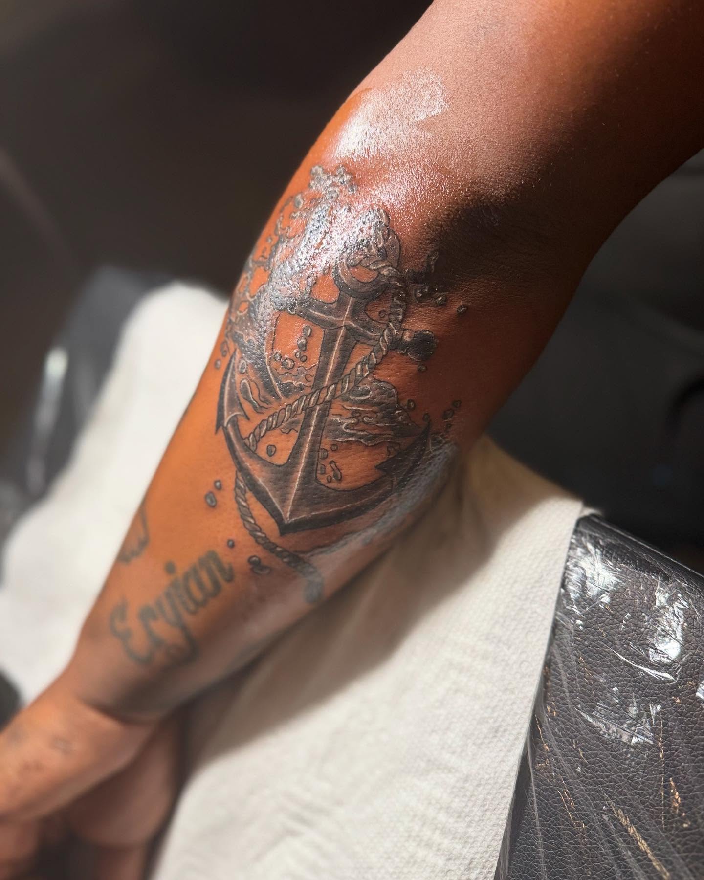 Anchor black and grey tattoo on the forearm by Illuminink.gallery