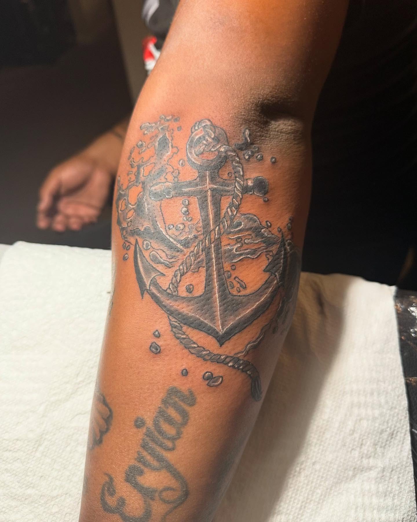 Anchor black and grey tattoo on the forearm by Illuminink.gallery