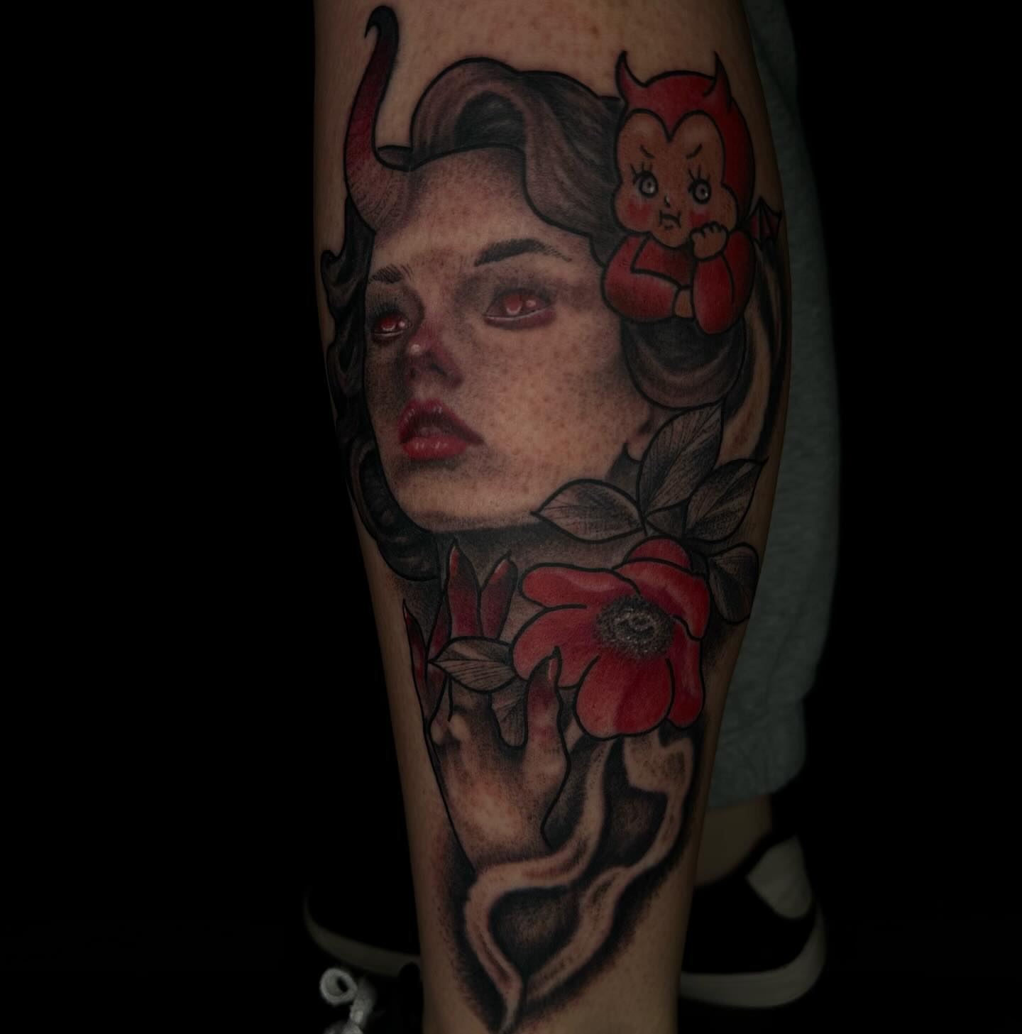 Woman with devil dark realism tattoo on the forearm by Jay Morales