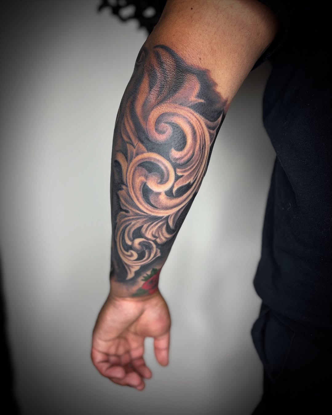 Ornamental scrollwork Chicano tattoo on the forearm by Adrian Ram 🇬🇾🇵🇭