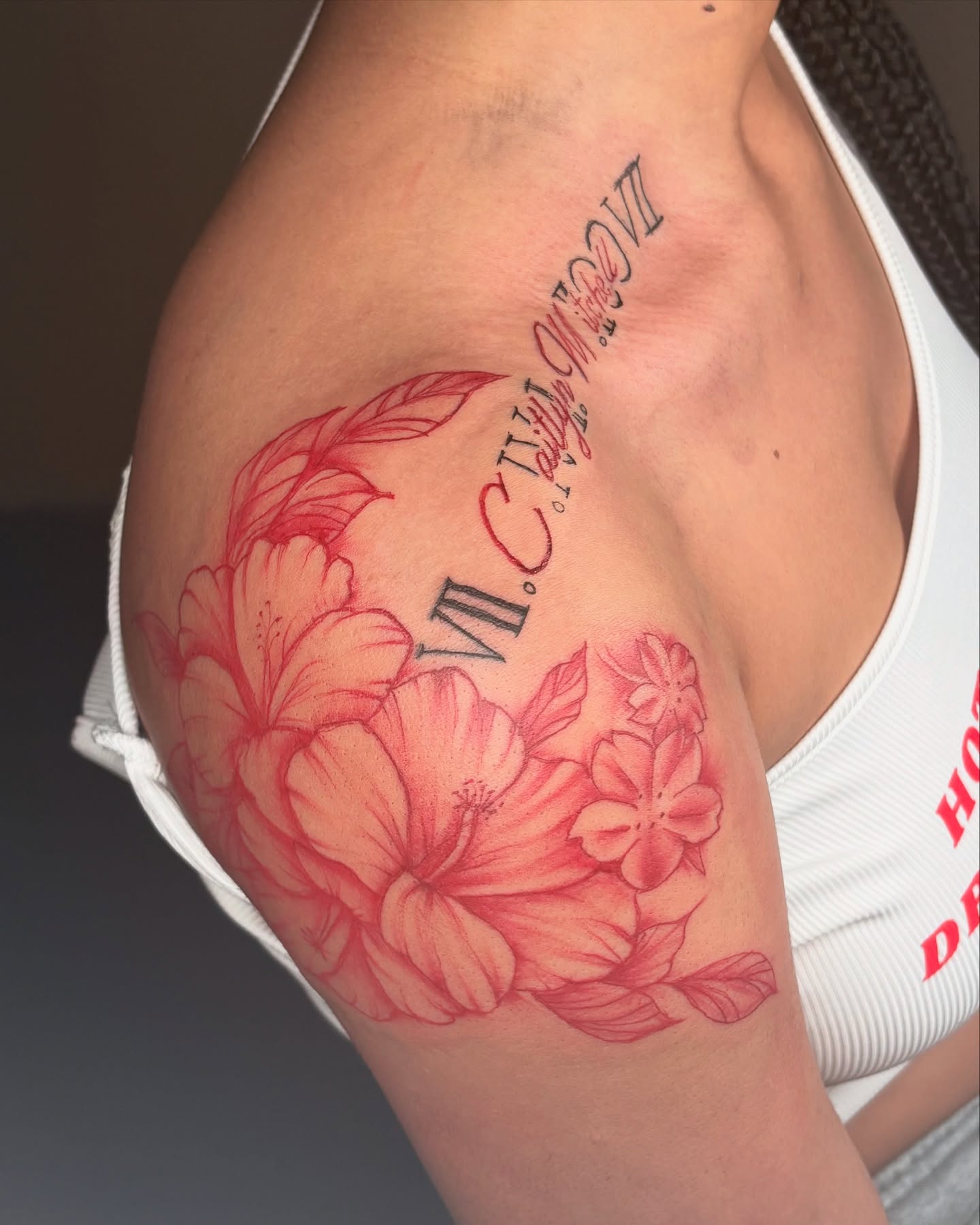 Floral arrangement realism tattoo on the shoulder by Maleek Inkz
