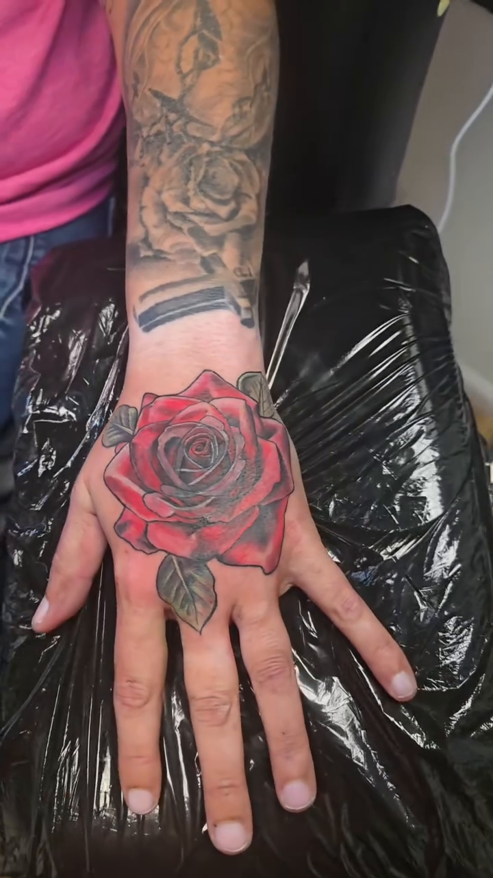 Rose neo-traditional tattoo by Camuel Whaley