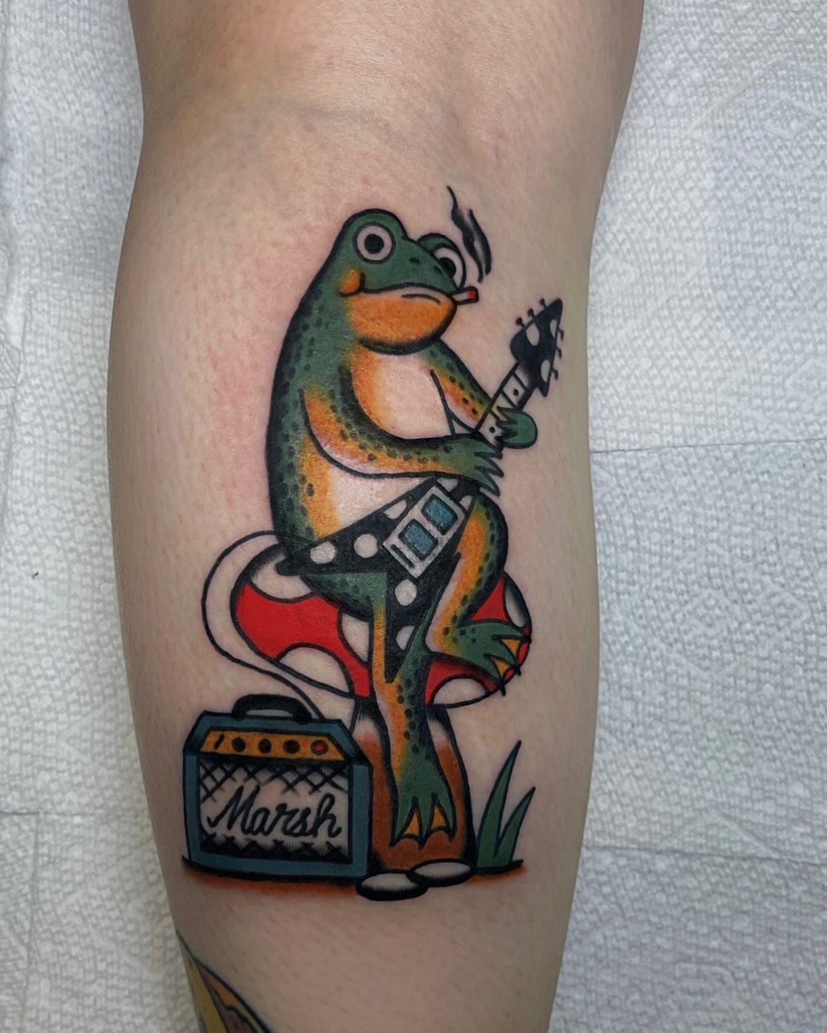 Frog playing guitar American traditional tattoo on the forearm by Elizabeth Summers ❨・¨⬮ Traditional Tattoo