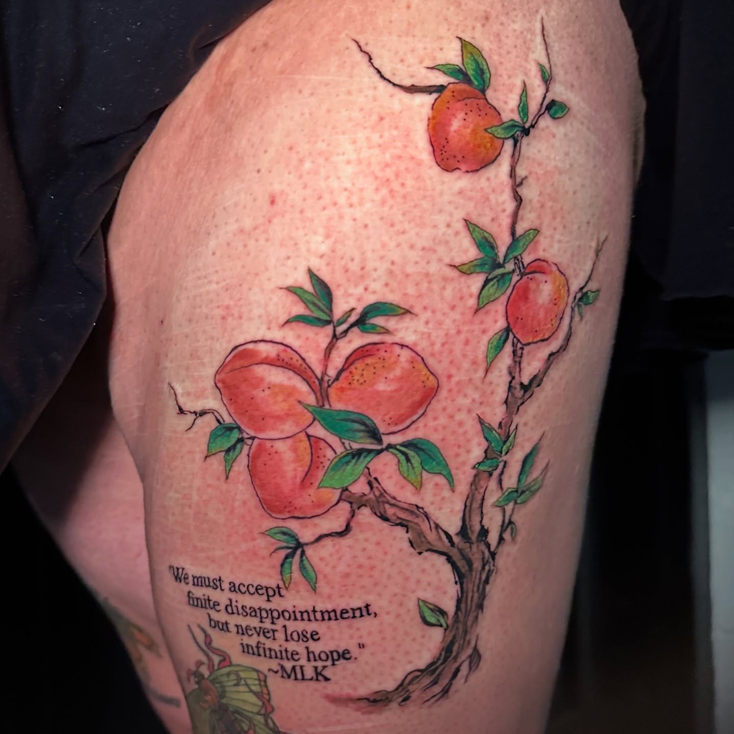 Peach tree with quote dotwork tattoo on the thigh by Svetlana
