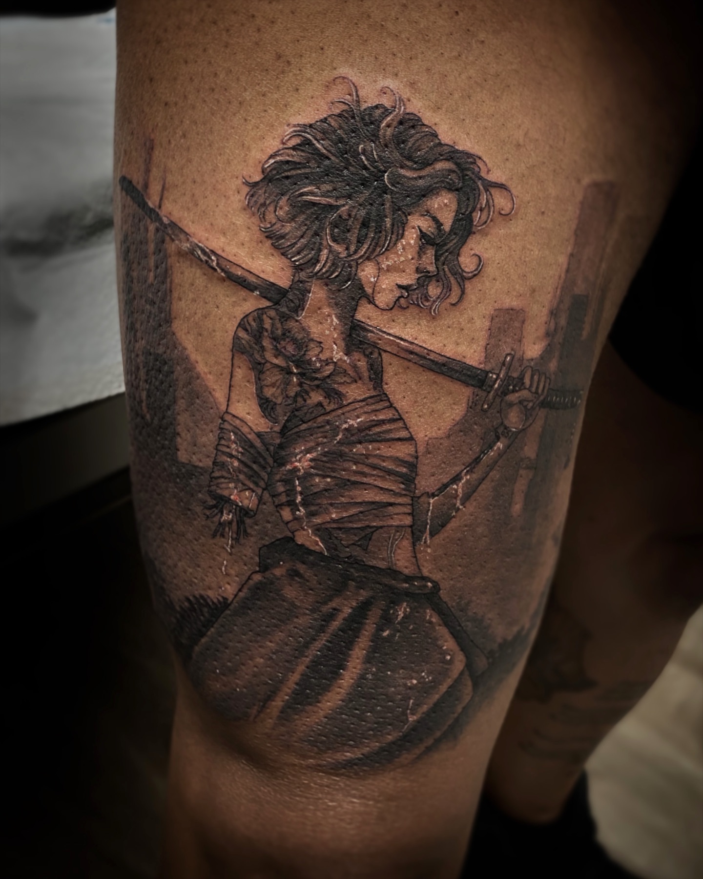 Woman with sword realism tattoo on the thigh by Jen Petronella