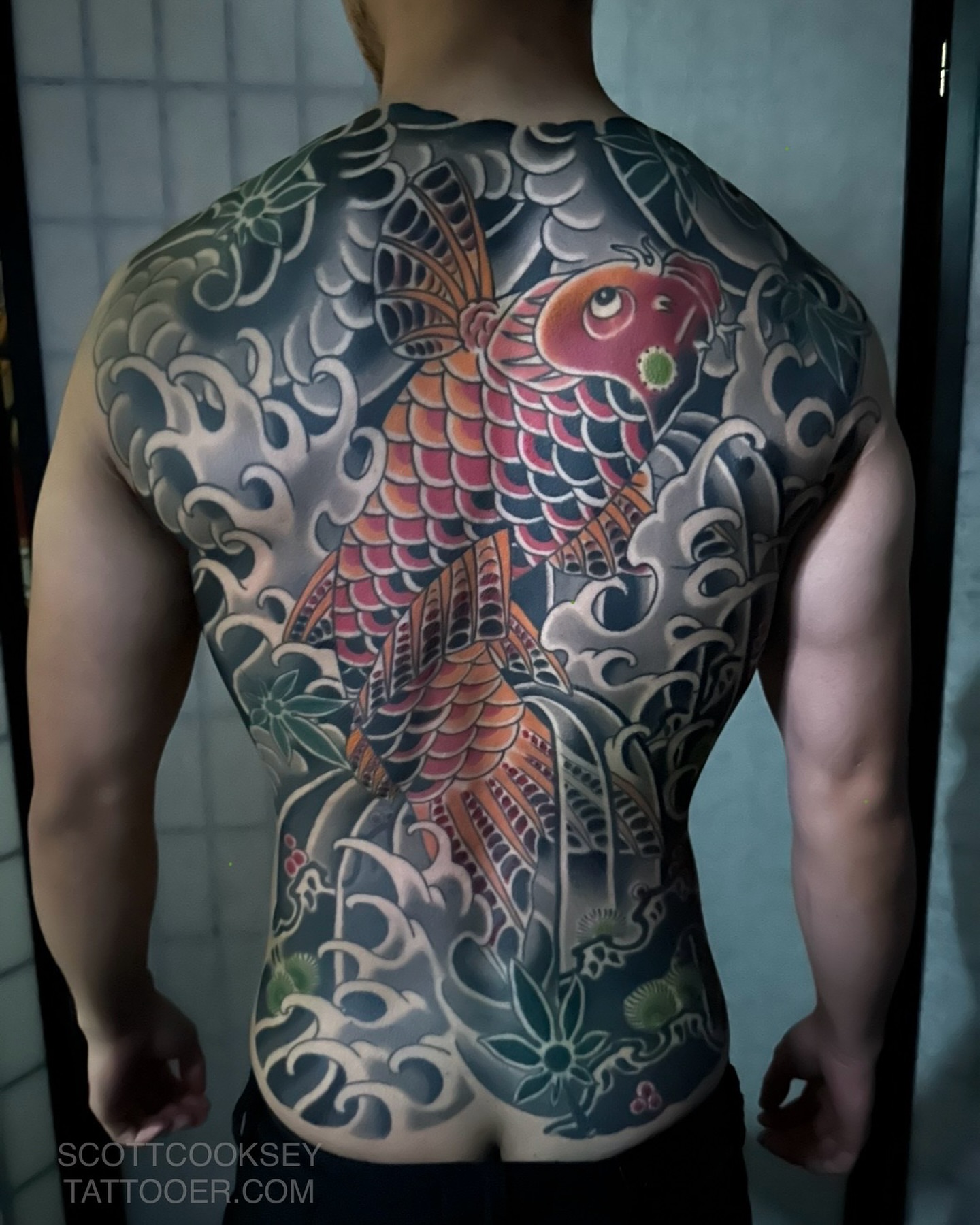 Koi fish japanese irezumi tattoo on the back by Scott Allen Cooksey, Plano, Texas