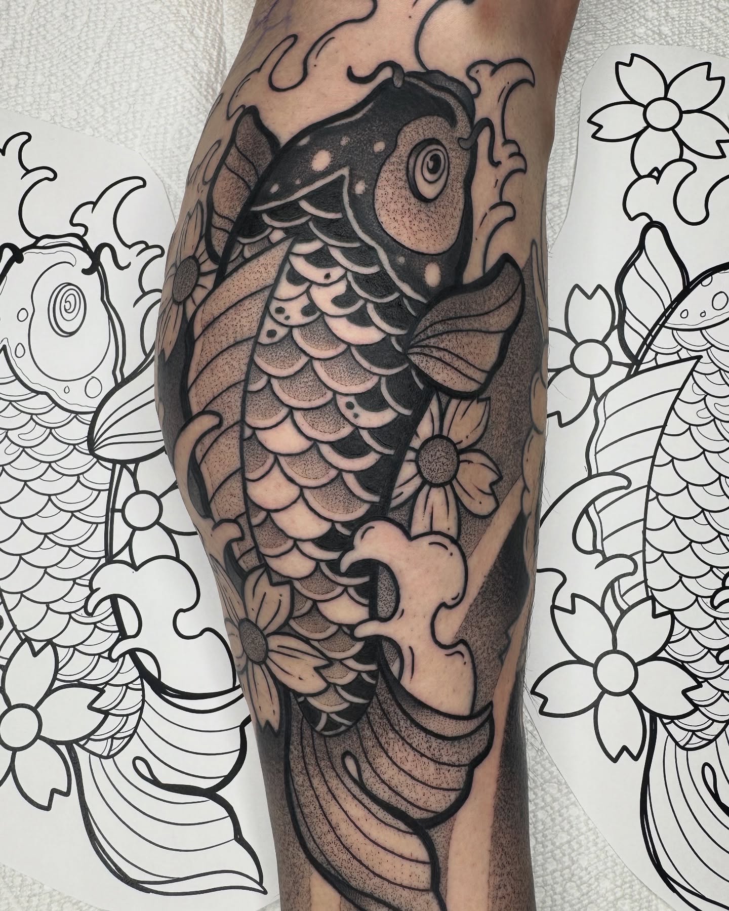 Koi fish dotwork tattoo on the forearm by Donnie Moore