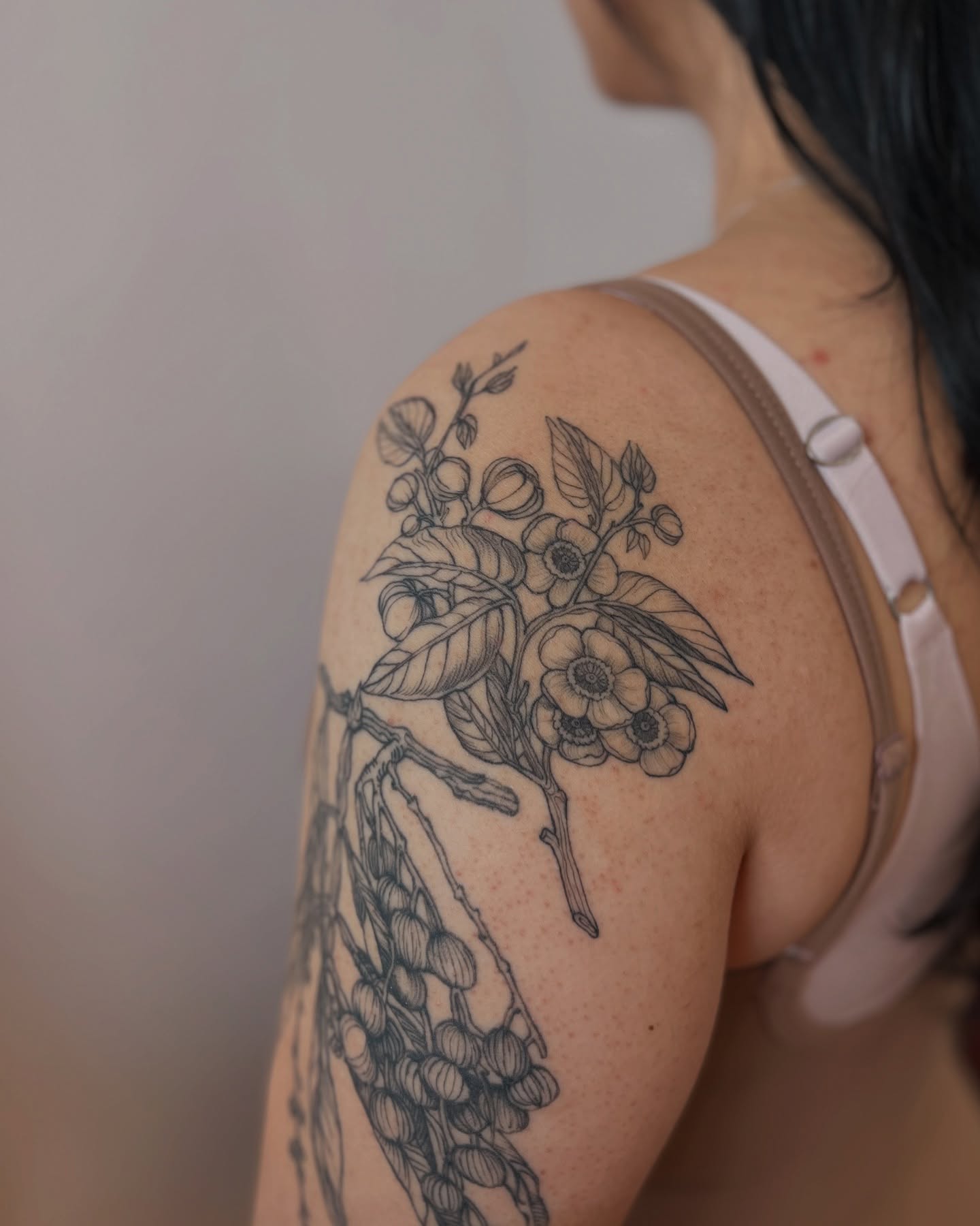 Flower bouquet black and grey tattoo on the shoulder by Ying Xeon