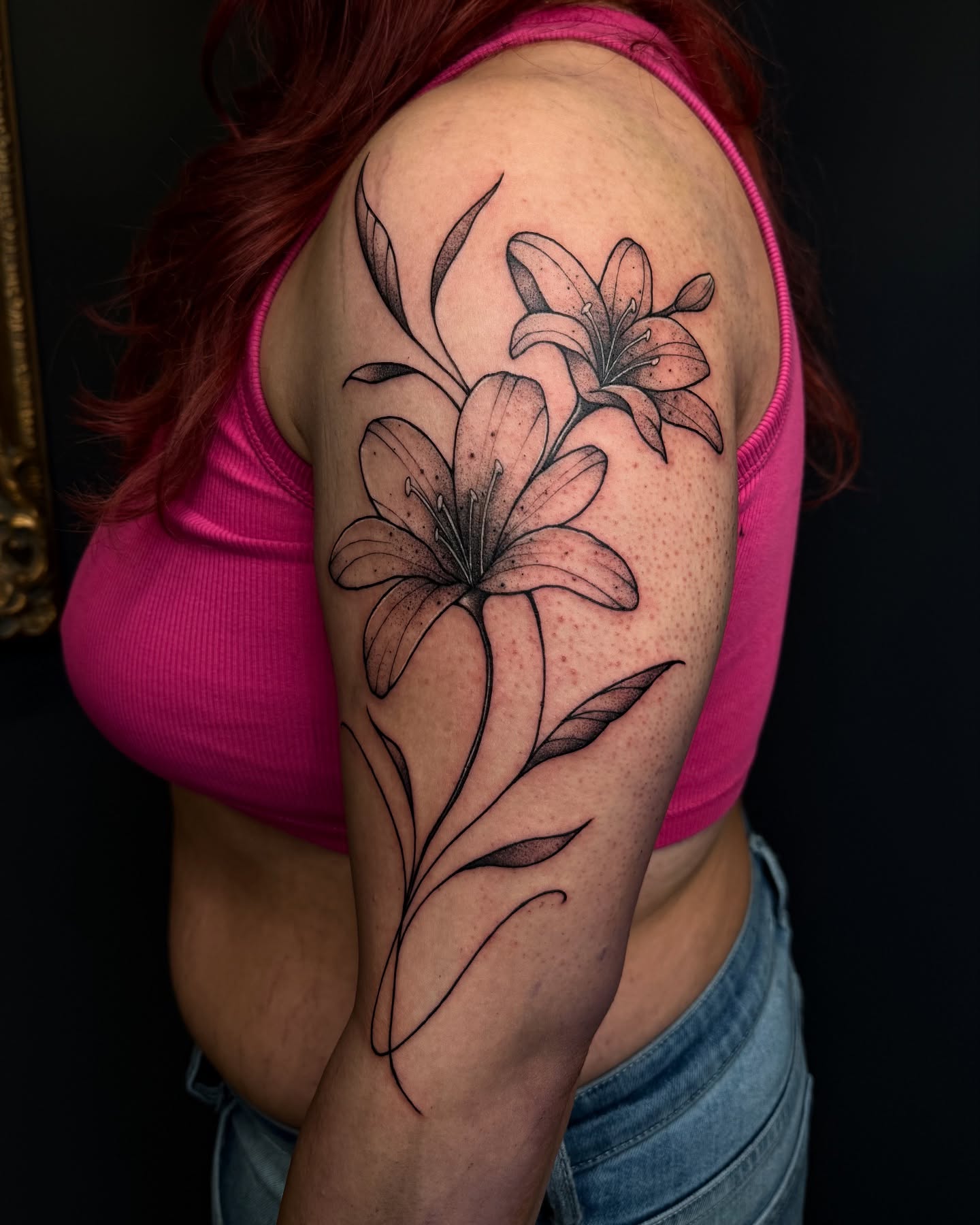Lilies dotwork tattoo on the shoulder by dinah