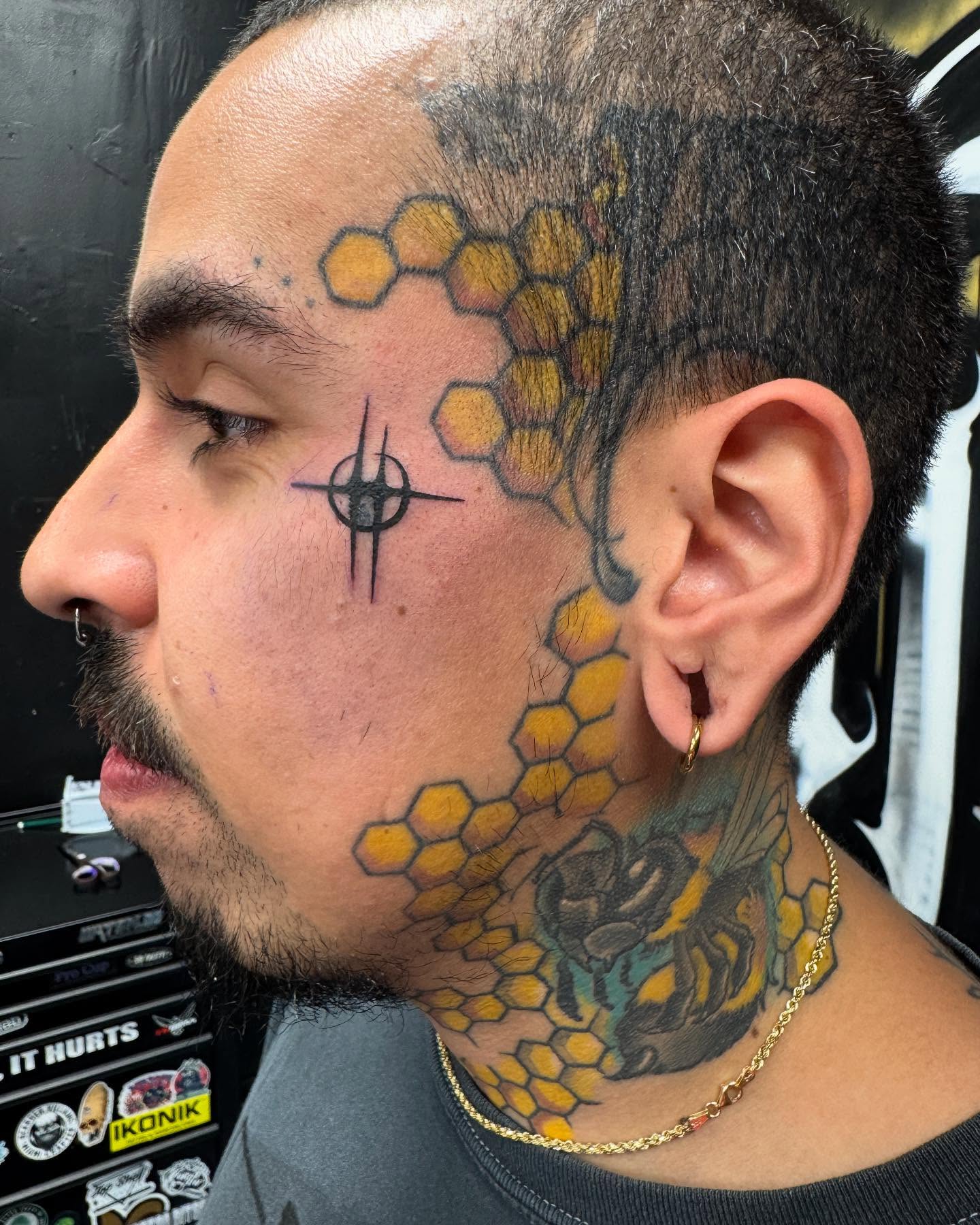 Honeycomb pattern geometric tattoo on the head by Carla V