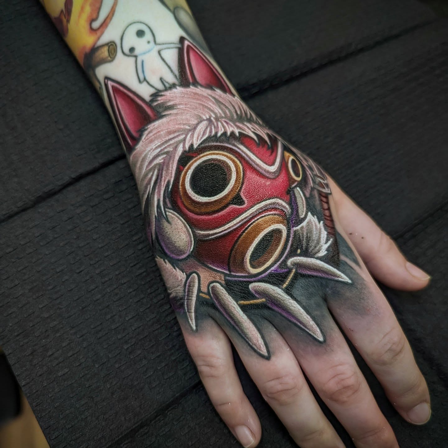 Mask japanese irezumi tattoo on the hand by Matt Driscoll