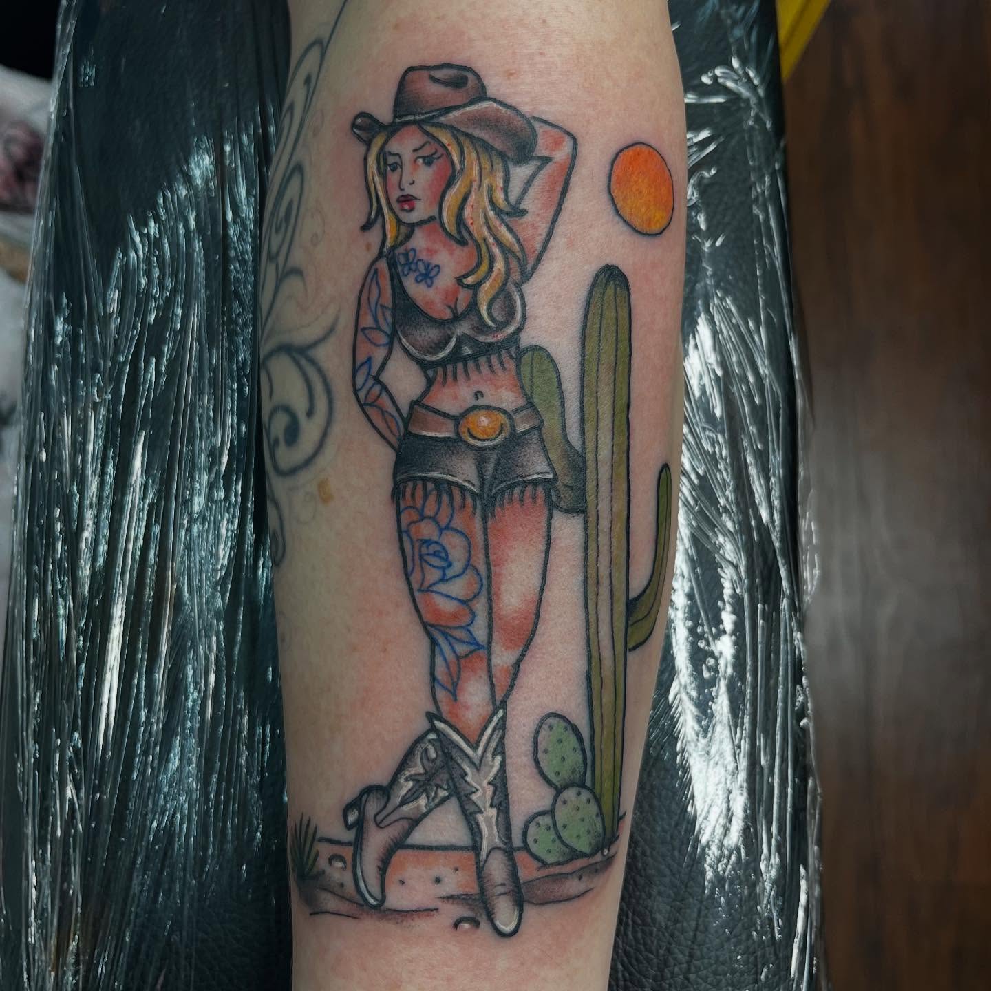 Cowgirl American traditional tattoo on the forearm by Jess
