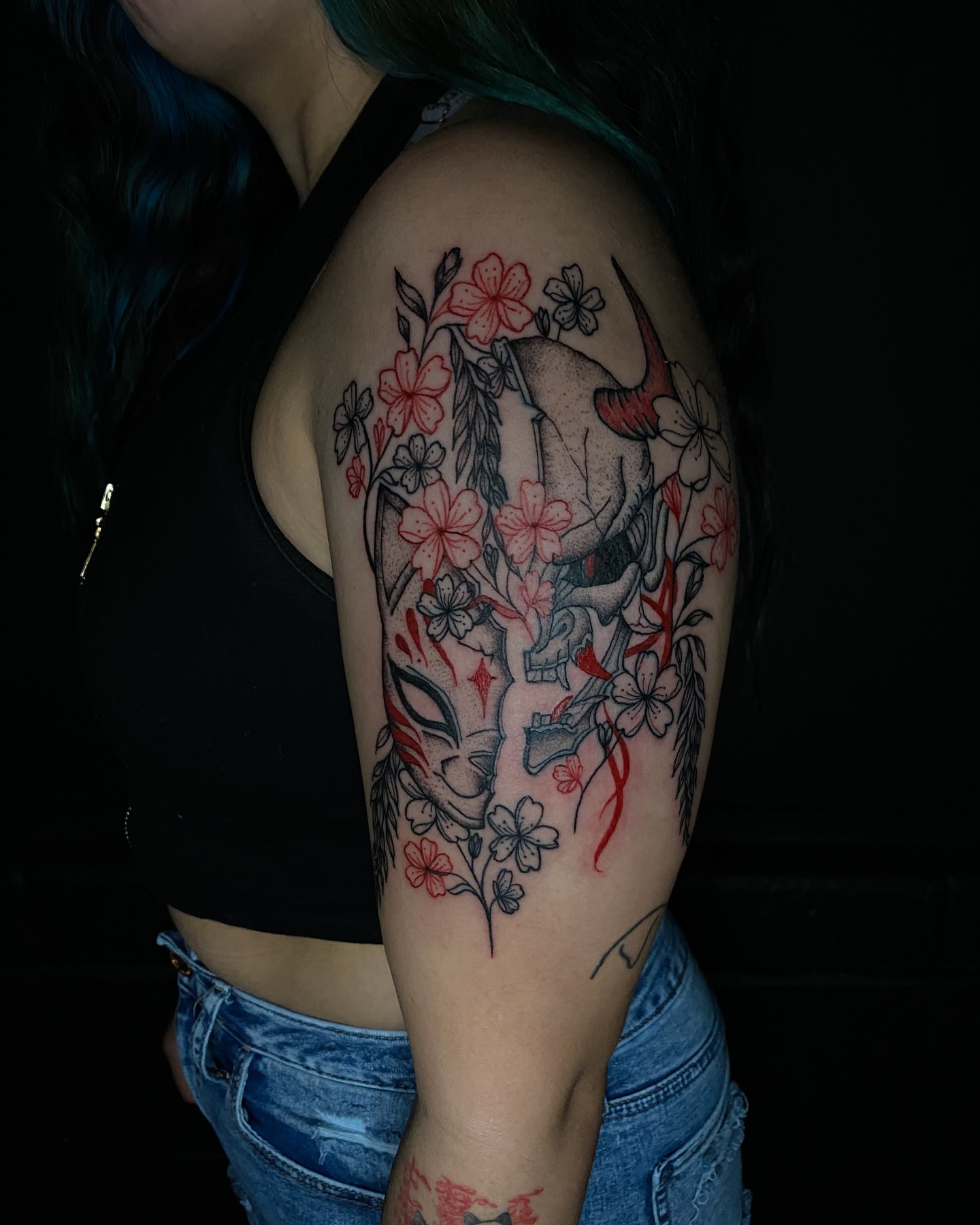 Bull skull with flowers American traditional tattoo on the shoulder by @inkspirationtattoo_co