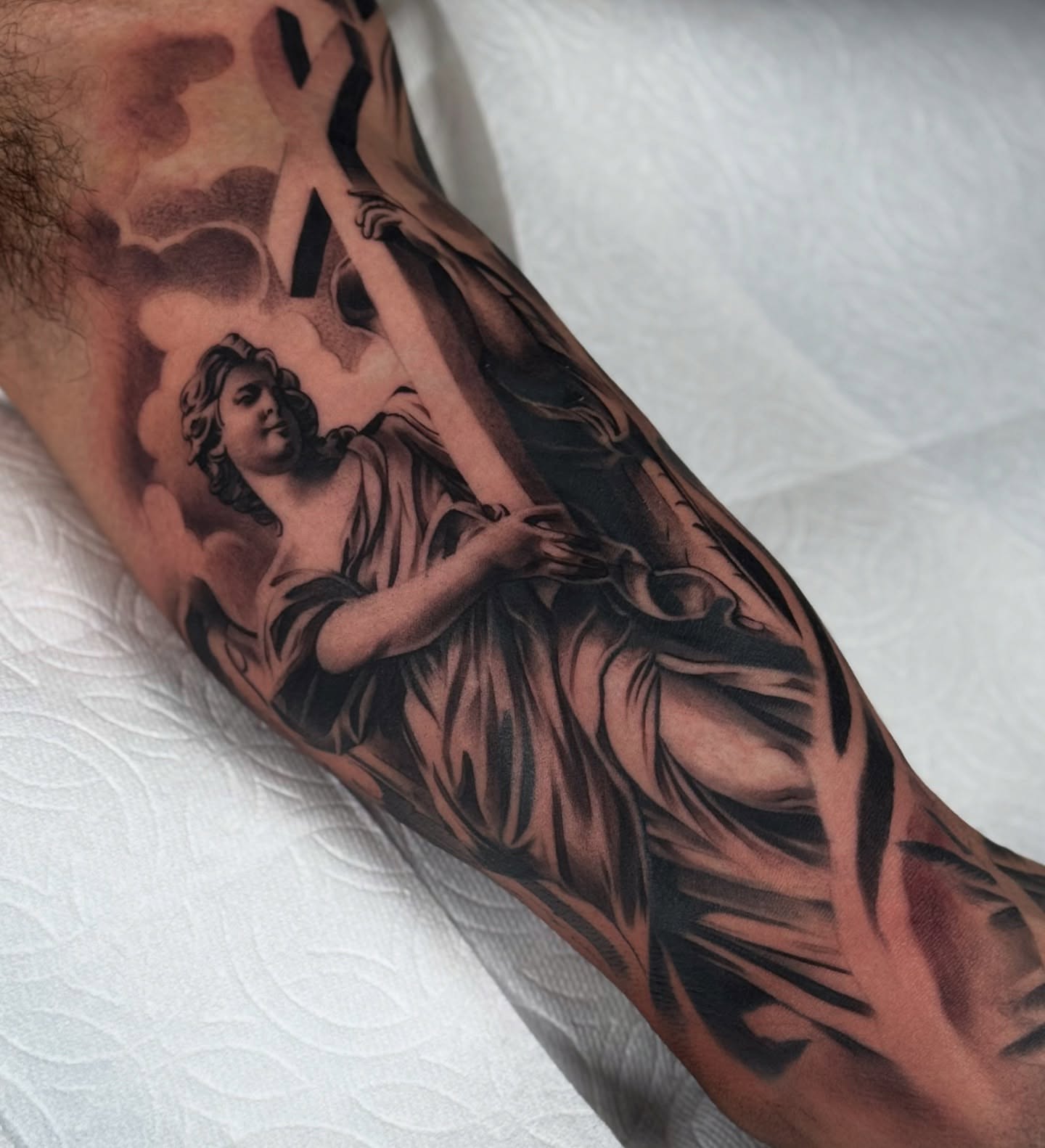 Angelic figure realism tattoo on the forearm by 🇵🇭Joseph Passion