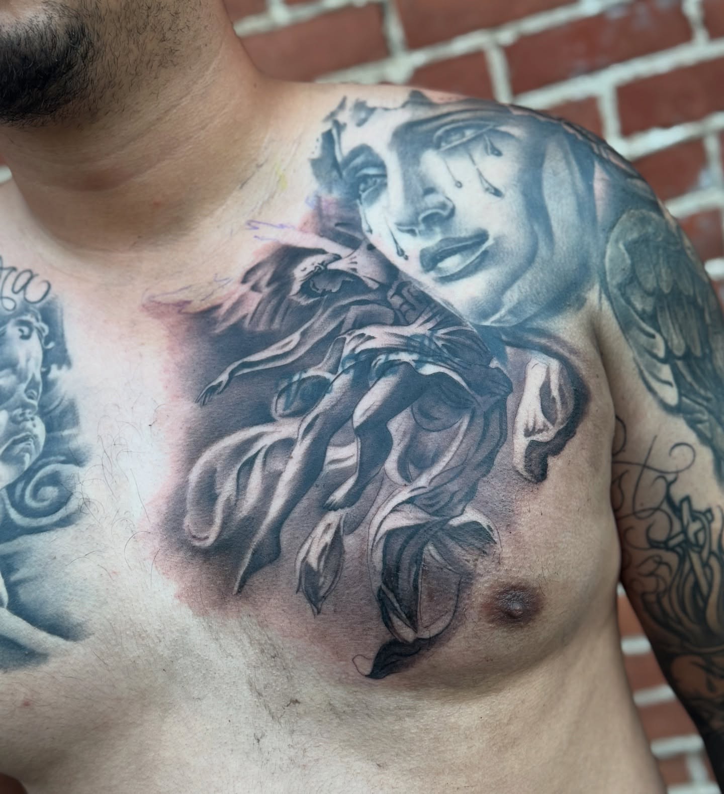 Weeping angel realism tattoo on the chest by Angel Pineda-Rodriguez