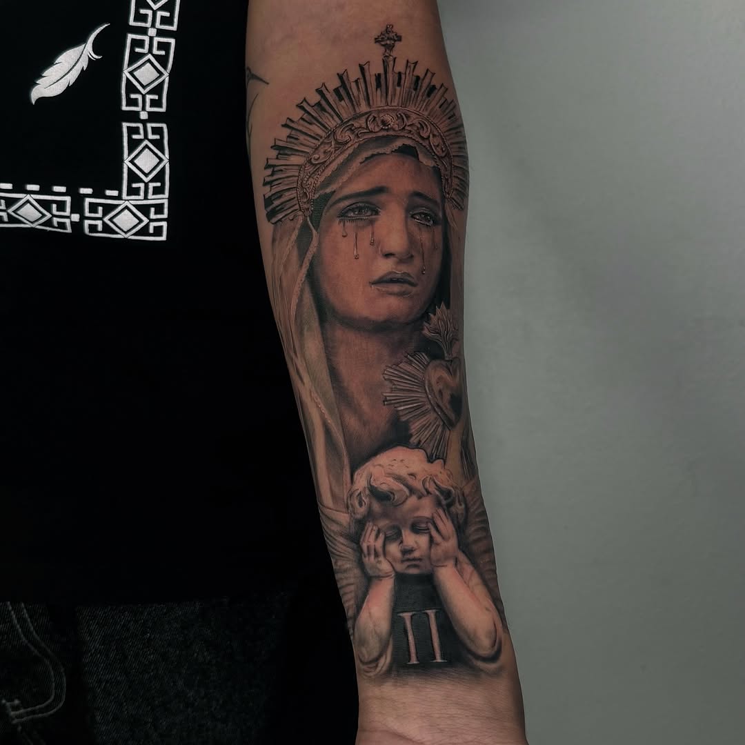 Virgin Mary and cherub Chicano tattoo on the forearm by josselyn ☪︎