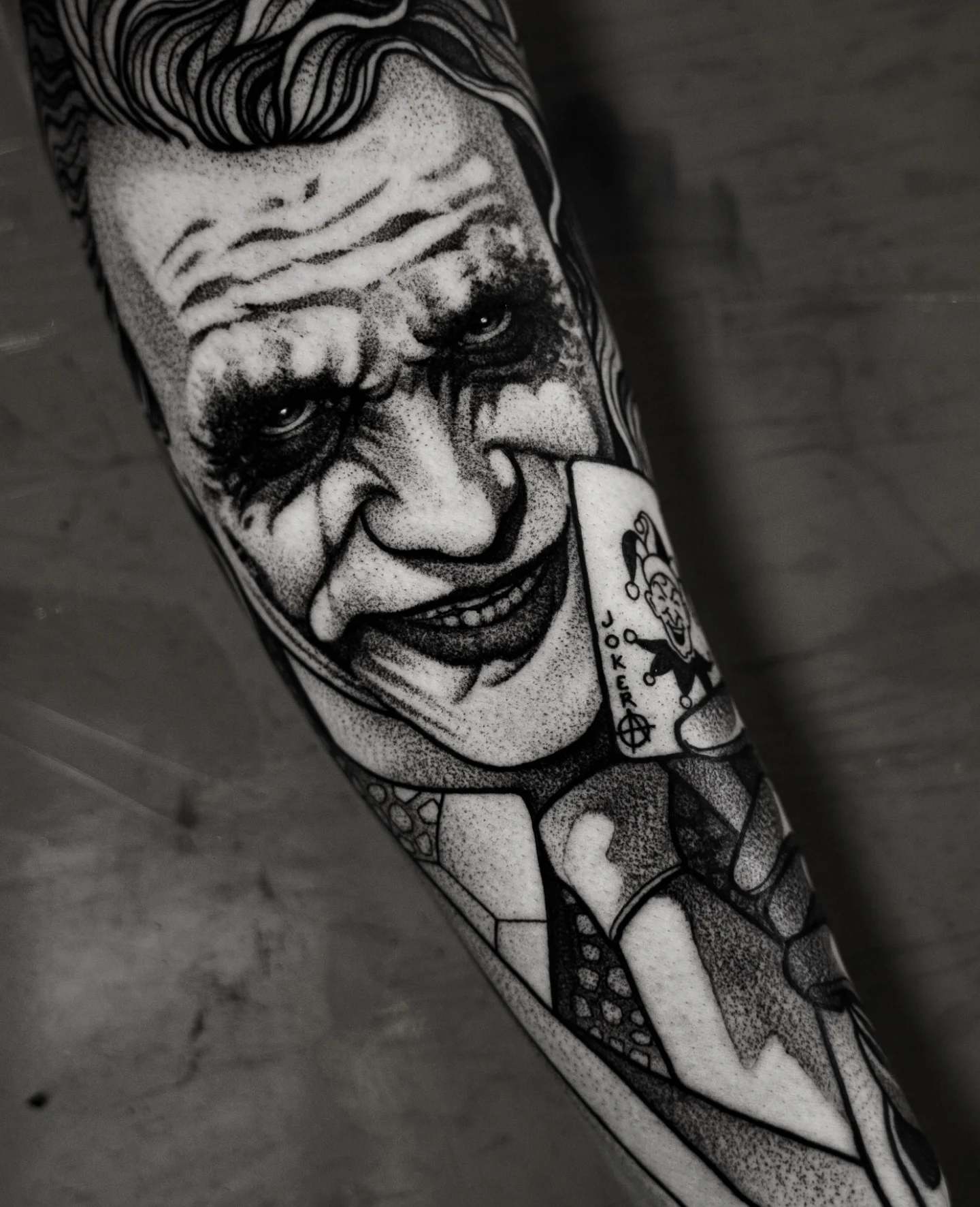 Joker dotwork tattoo on the forearm by Craig St Peter, Kansas City, Missouri
