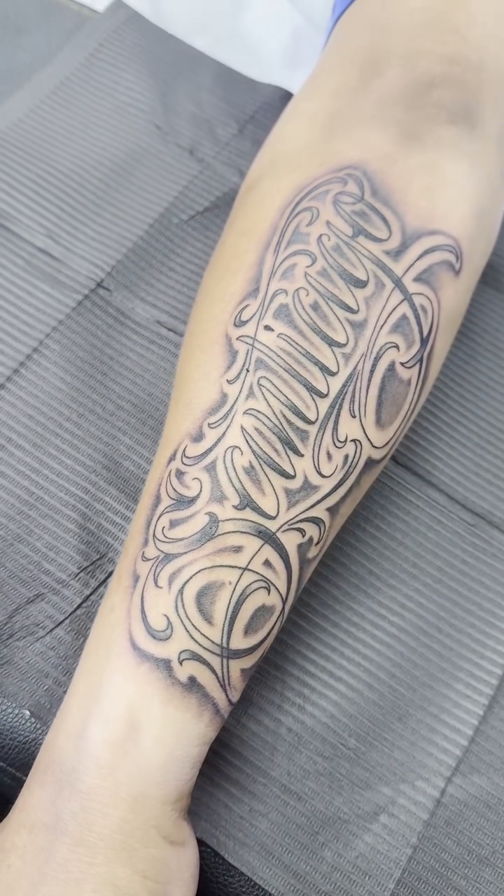 Tattoo by @anheartistxo — lettering_script, chicano