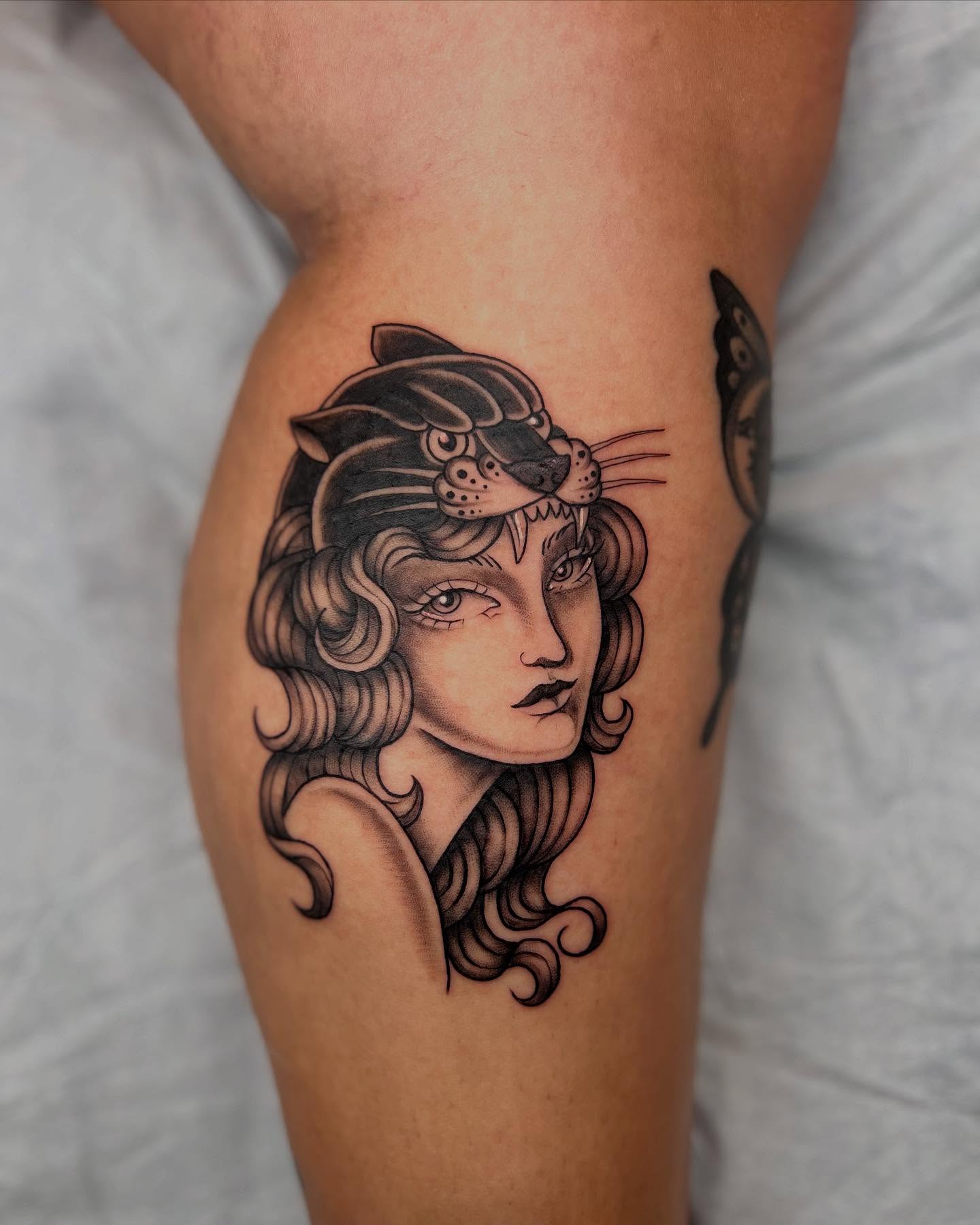 Woman with cat ears realism tattoo on the thigh by Tasha Venola, Bellingham, Washington