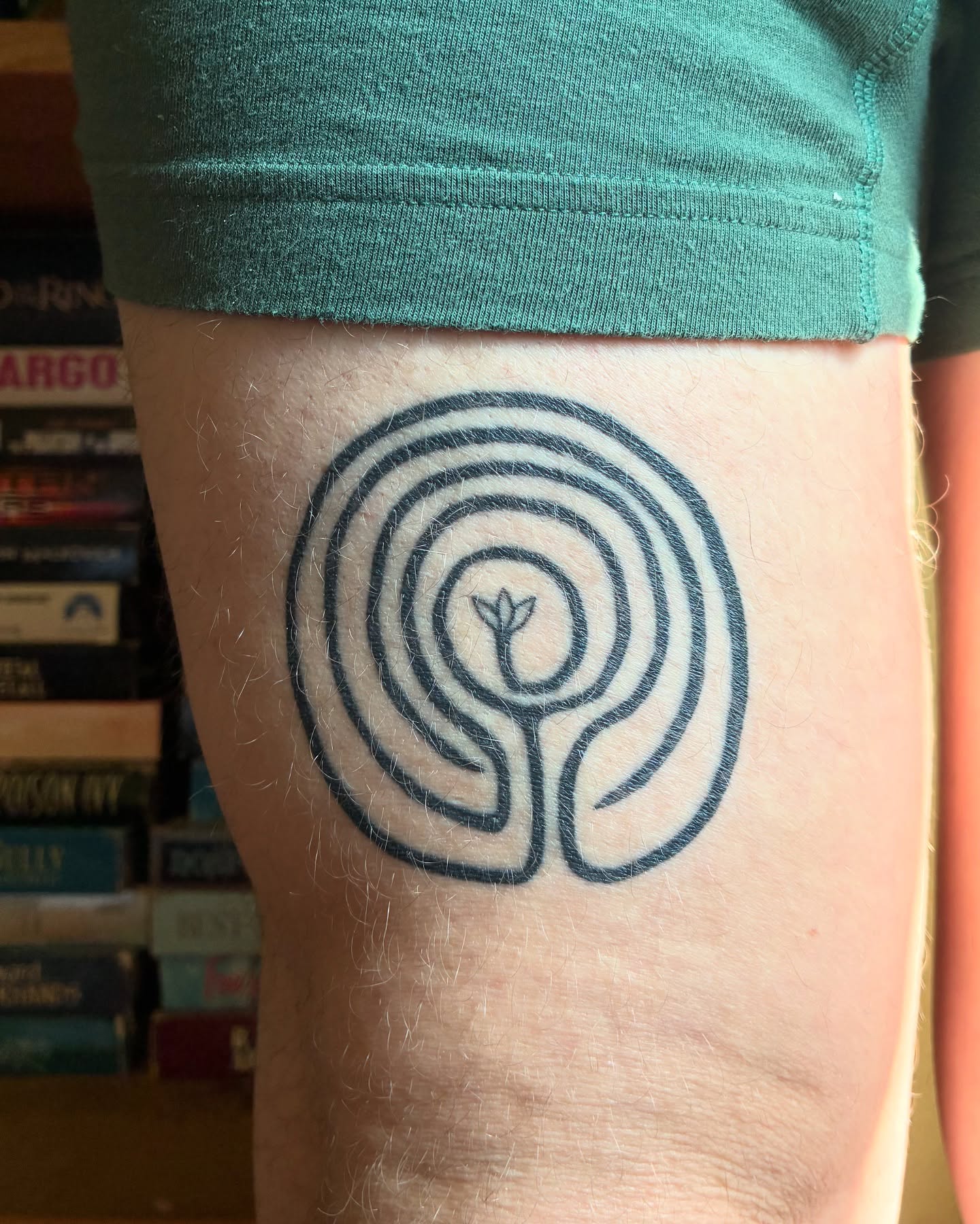 Labyrinth geometric tattoo on the thigh by Steph Liebetreu