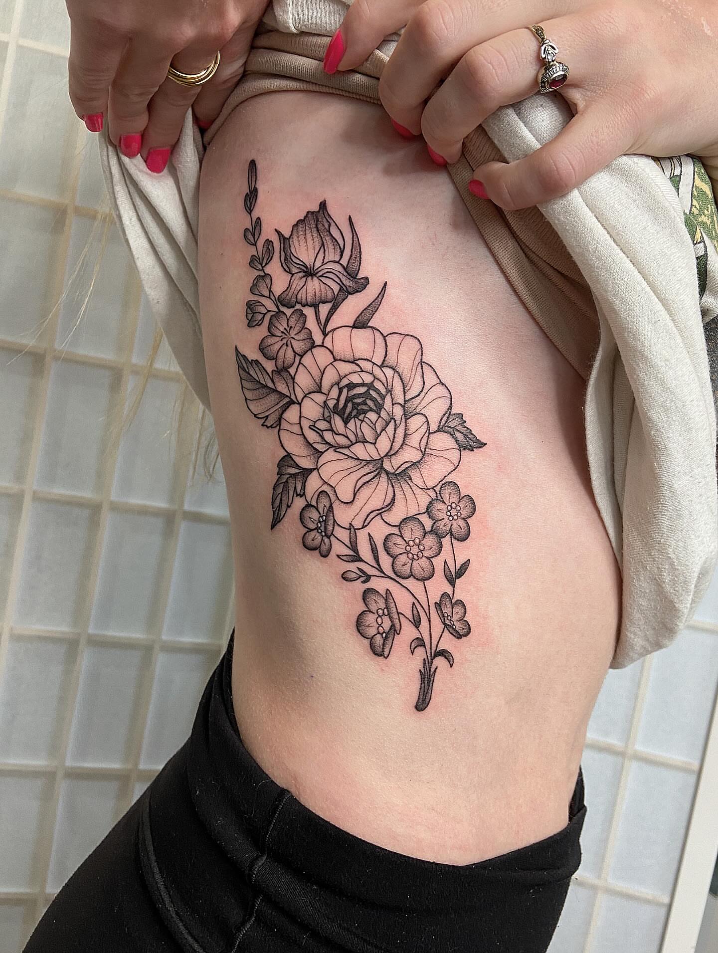 Floral bouquet black and grey tattoo on the thigh by Tattoos by Dale Hupke, Lebanon, Ohio