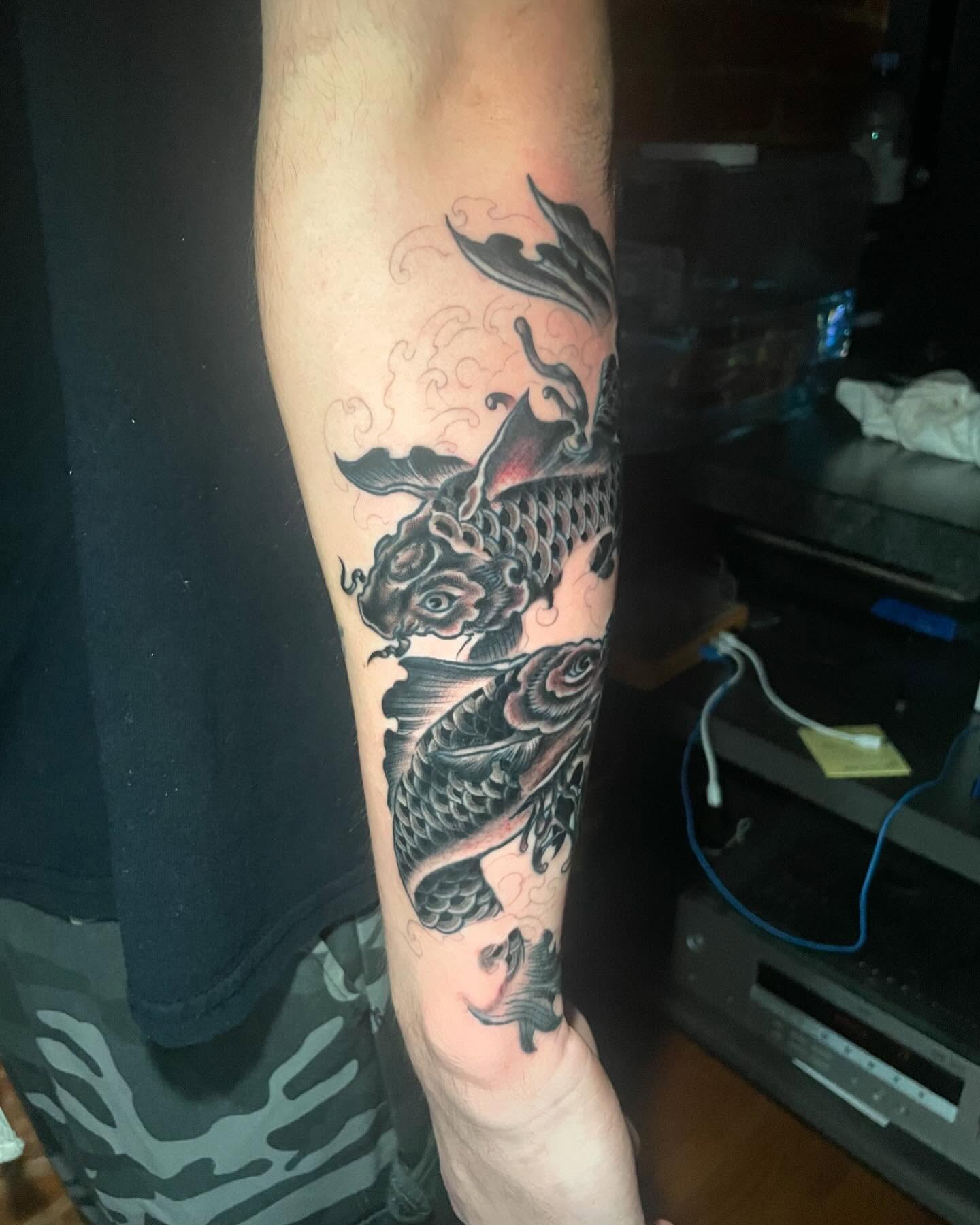 Koi fish japanese irezumi tattoo on the forearm by Auzzy the Ink Pirate, Mansfield, Ohio