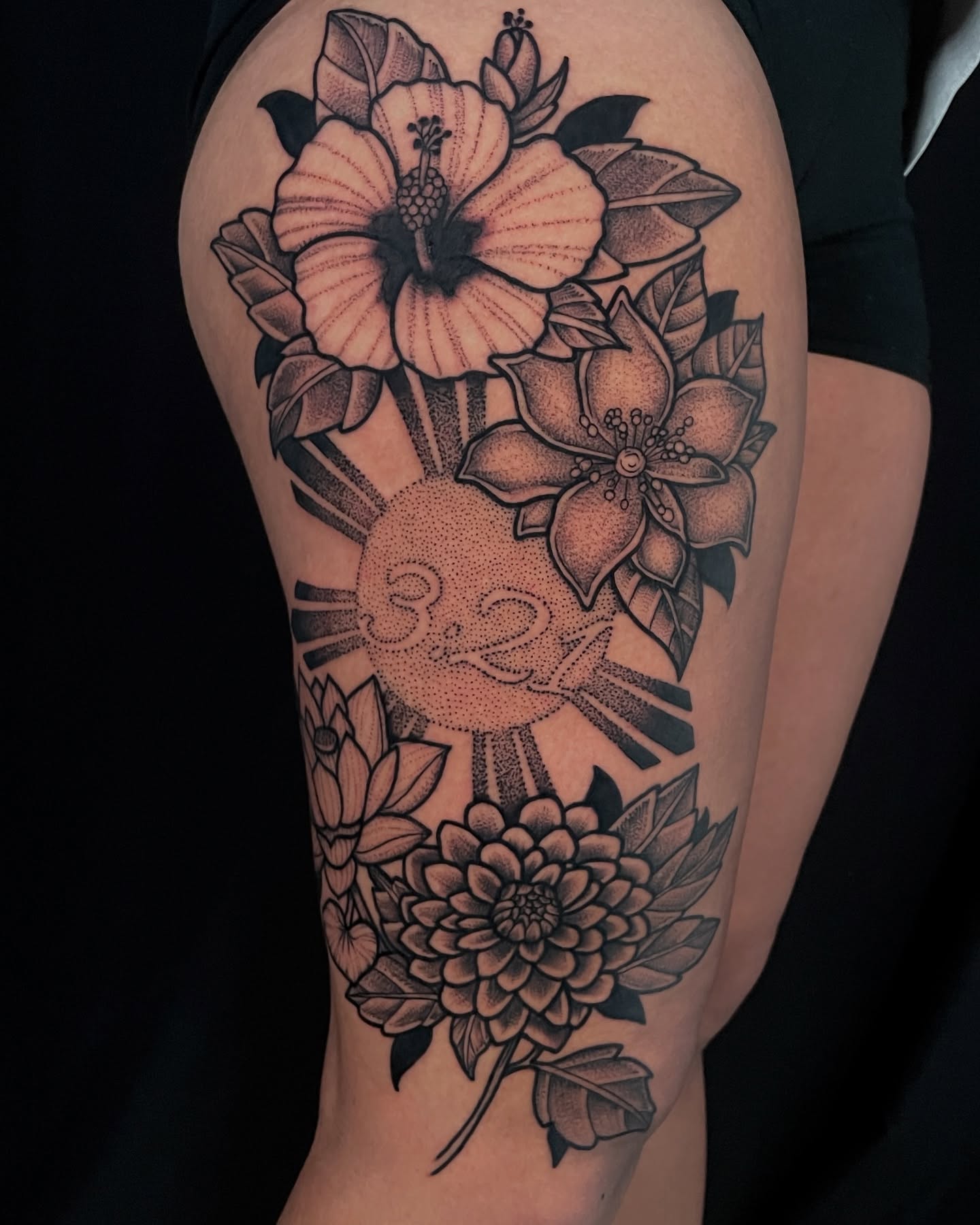 Floral bouquet dotwork tattoo on the thigh by Austin Clark