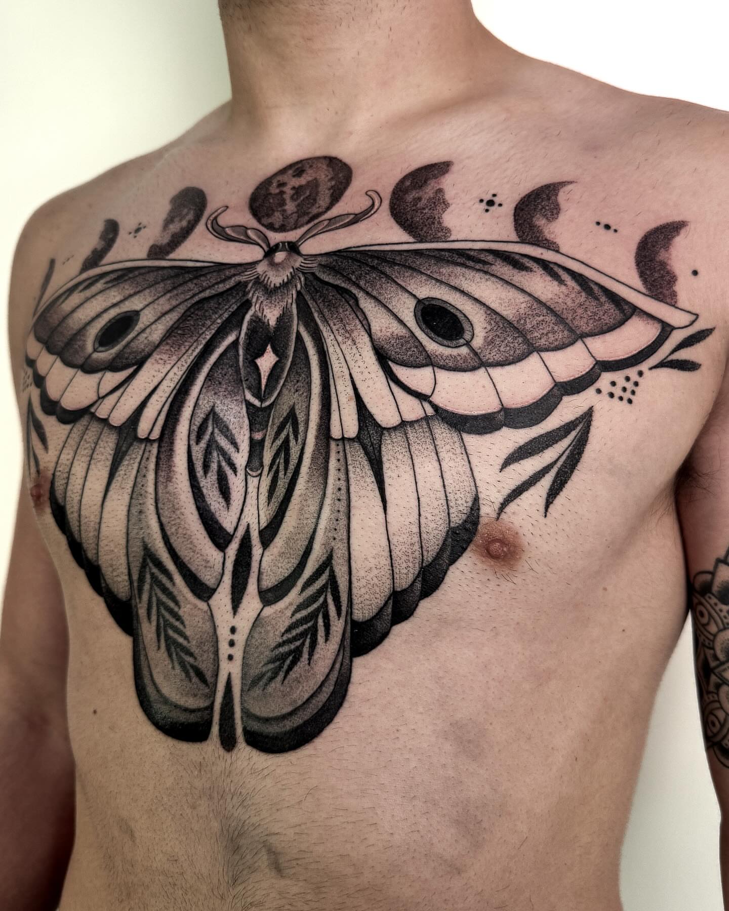 Moth dotwork tattoo on the chest by Jamie Beach, Wheat Ridge, Colorado