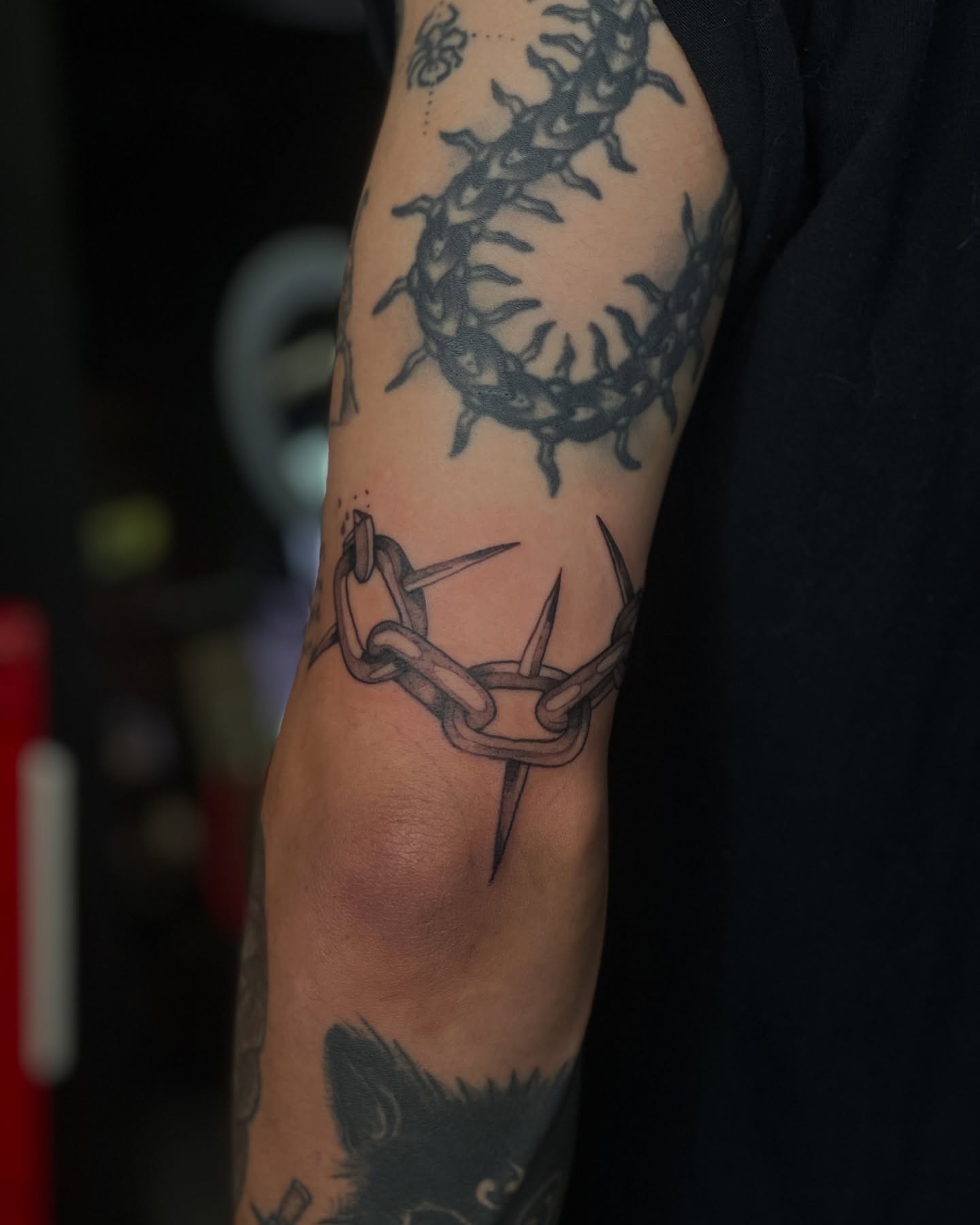 Barbed wire and nails black and grey tattoo on the forearm by ⊹ * . 𝕵az ⊹ * .