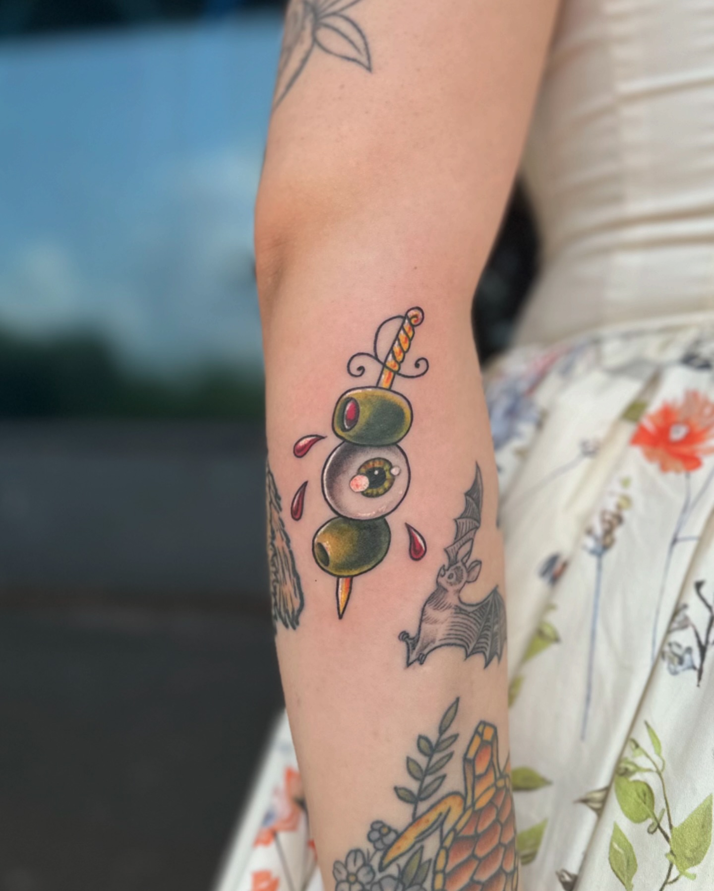 Eye and sword American traditional tattoo on the forearm by Savy Rasor, Austin, Texas