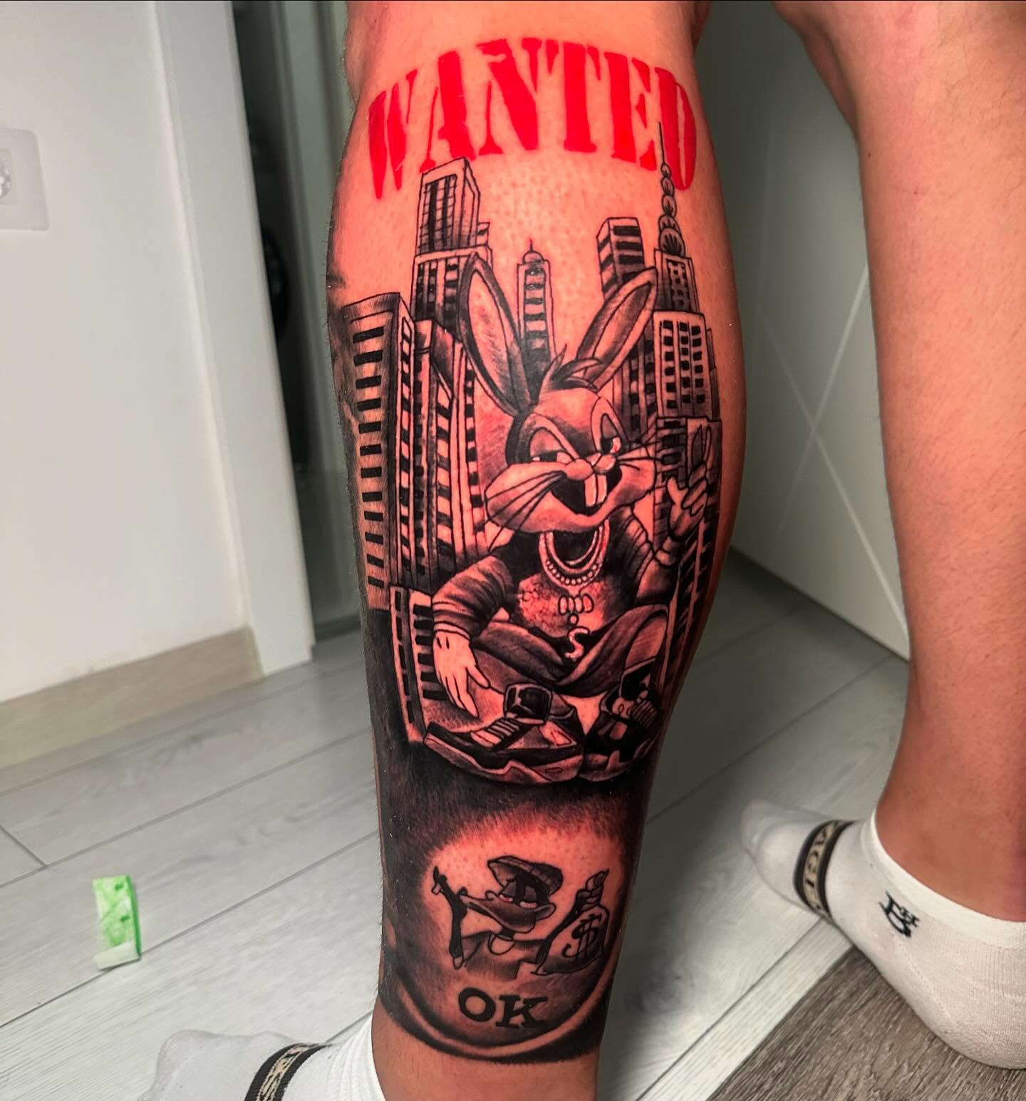 Looney tunes character American traditional tattoo on the calf by Anghel Patricia
