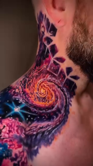 Galaxy and floral elements realism tattoo by Colorful Tattoos by Cody Dean