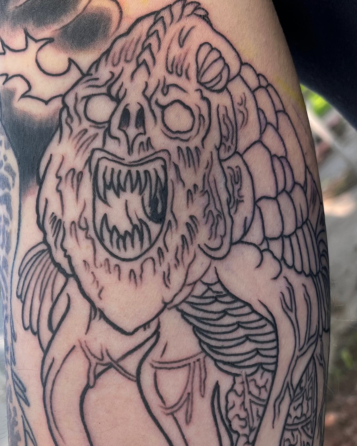 Monster black and grey tattoo on the forearm by TYP 419, Toledo, Ohio