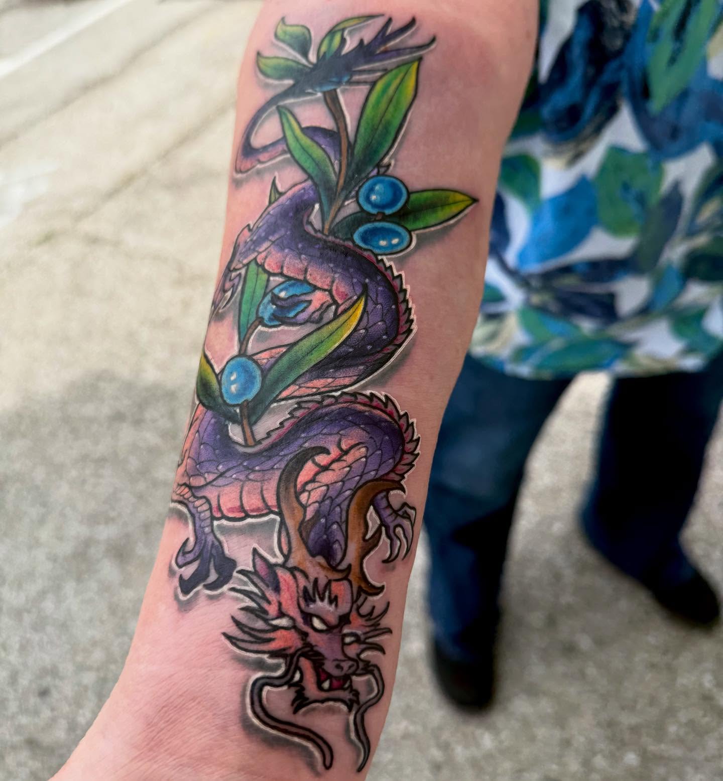 Dragon and leaves japanese irezumi tattoo on the forearm by Michael Latendresse